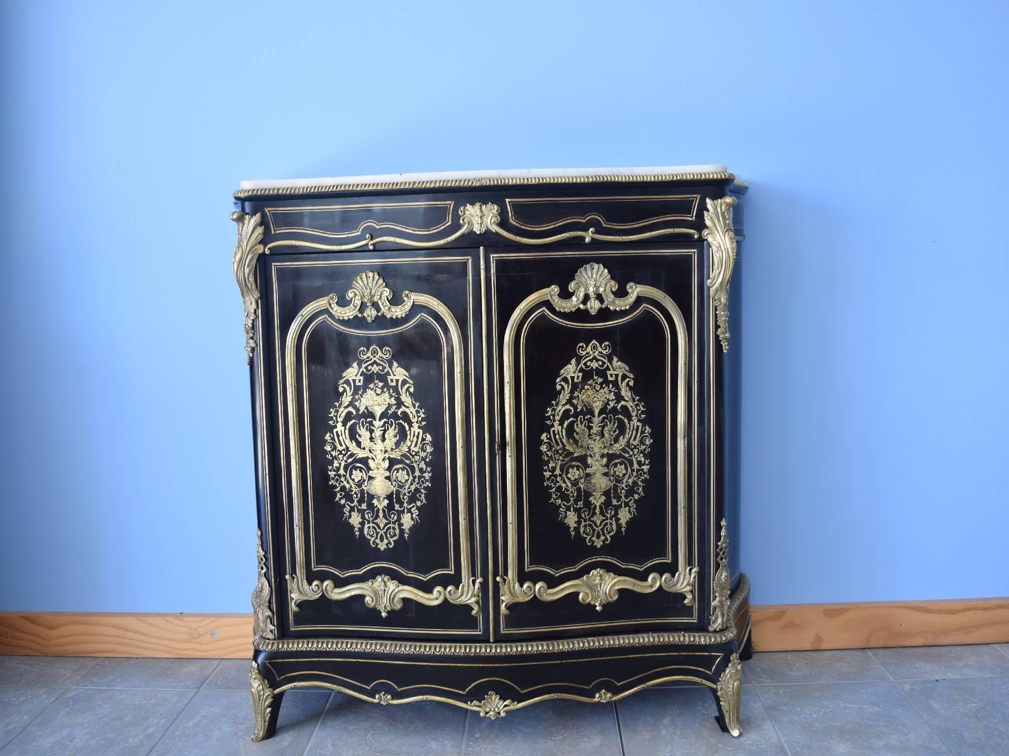 Large French cabinet, Napoleon III Boulle style with magnificent ornaments, white marble oakwood painted black with bronze and gilt ornaments. 

This large French cabinet dates, circa 1870-1880.

Size length 130 cm, depth 40 cm, height 110 cm.