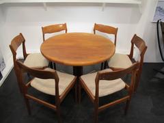 Danish Extending Teak Dining Table and Set of Eight Danish Teak Dining Chairs