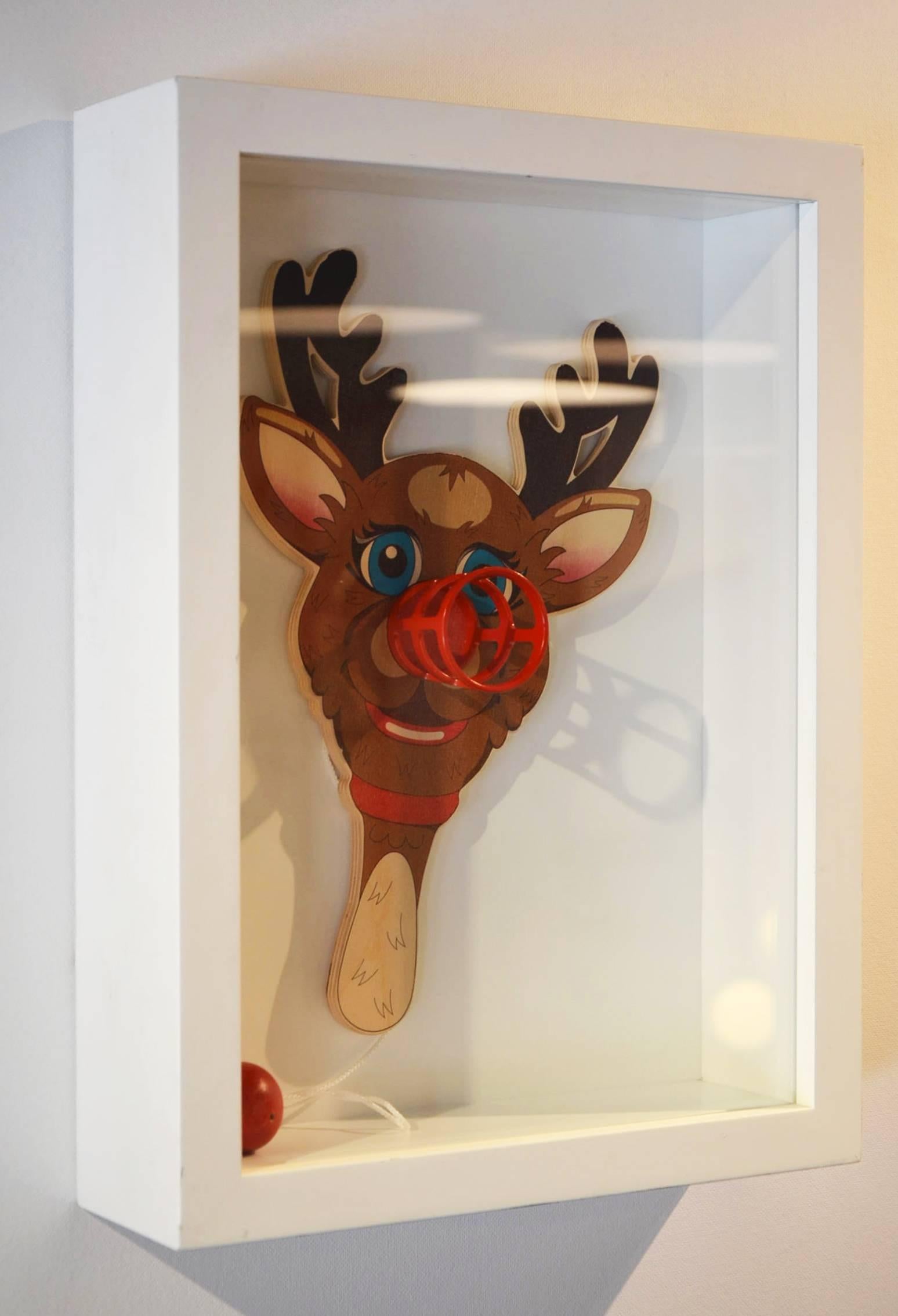 Plumbing the imagery of mass culture with works like this Rudolph the Red-Nosed Reindeer paddle, an edition of 900 created in conjunction with an exhibition at the Deutsche Guggenheim in 2000painted wood, plastic, metal and string.
Measures: 12 1/4