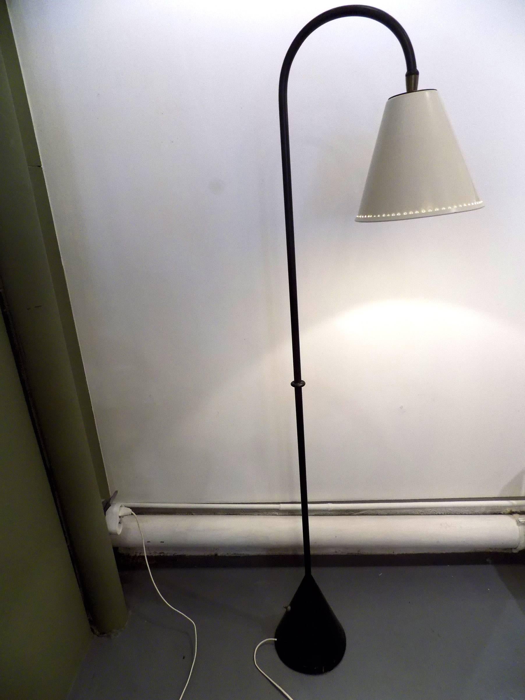 1950s Maison Lunel floor lamp. 
White lacquered adjustable lampshade.