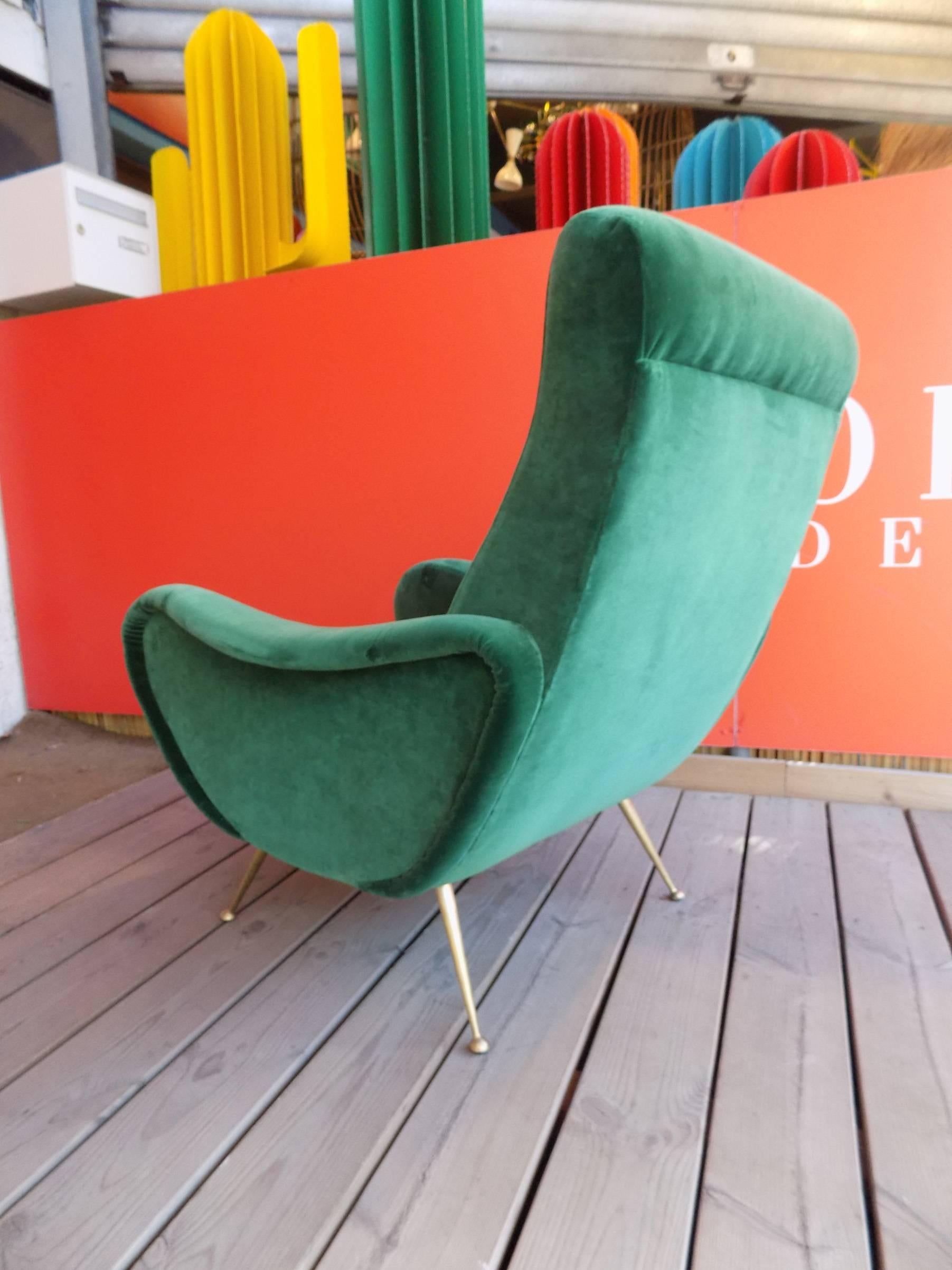 Italian pair of armchairs in the taste of Marco Zanuso, in green velvet with brass feet. 