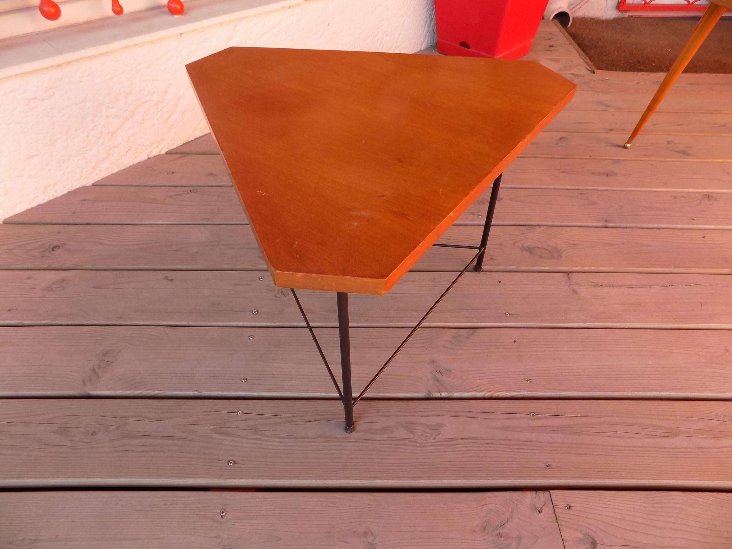 Italian wood and steel coffee table, circa 1960.