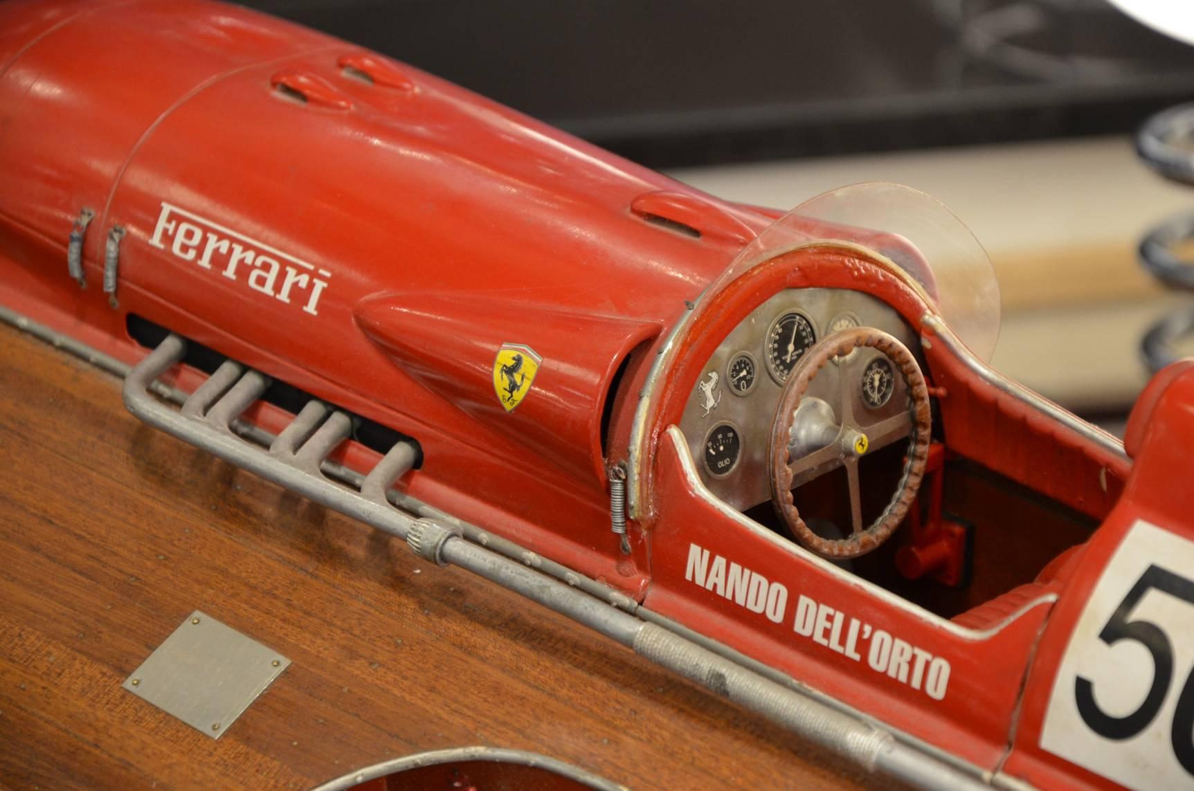 Excellent condition
Nando Dell'Orto model speedboat, the highly detailed model of one of several Ferrari 375 V12 engined speedboats that raced in Italian waters during the 1950s, probably 1:12th scale, featuring a four-spoke Ferrari steering wheel,