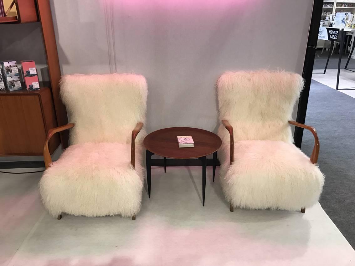 Fantastic pair of Italian reupholstered Tibet lamb fur, circa 1960.