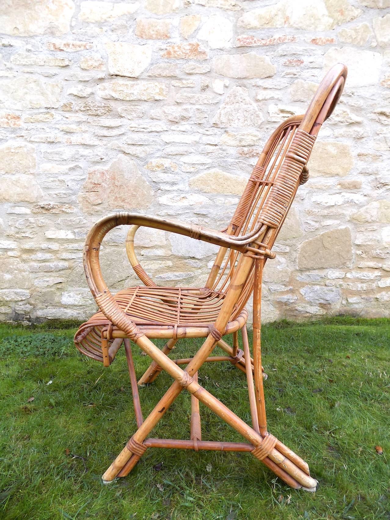 Beautiful wicker armchair by Audoux Minet, circa 1960. Excellent condition.
  