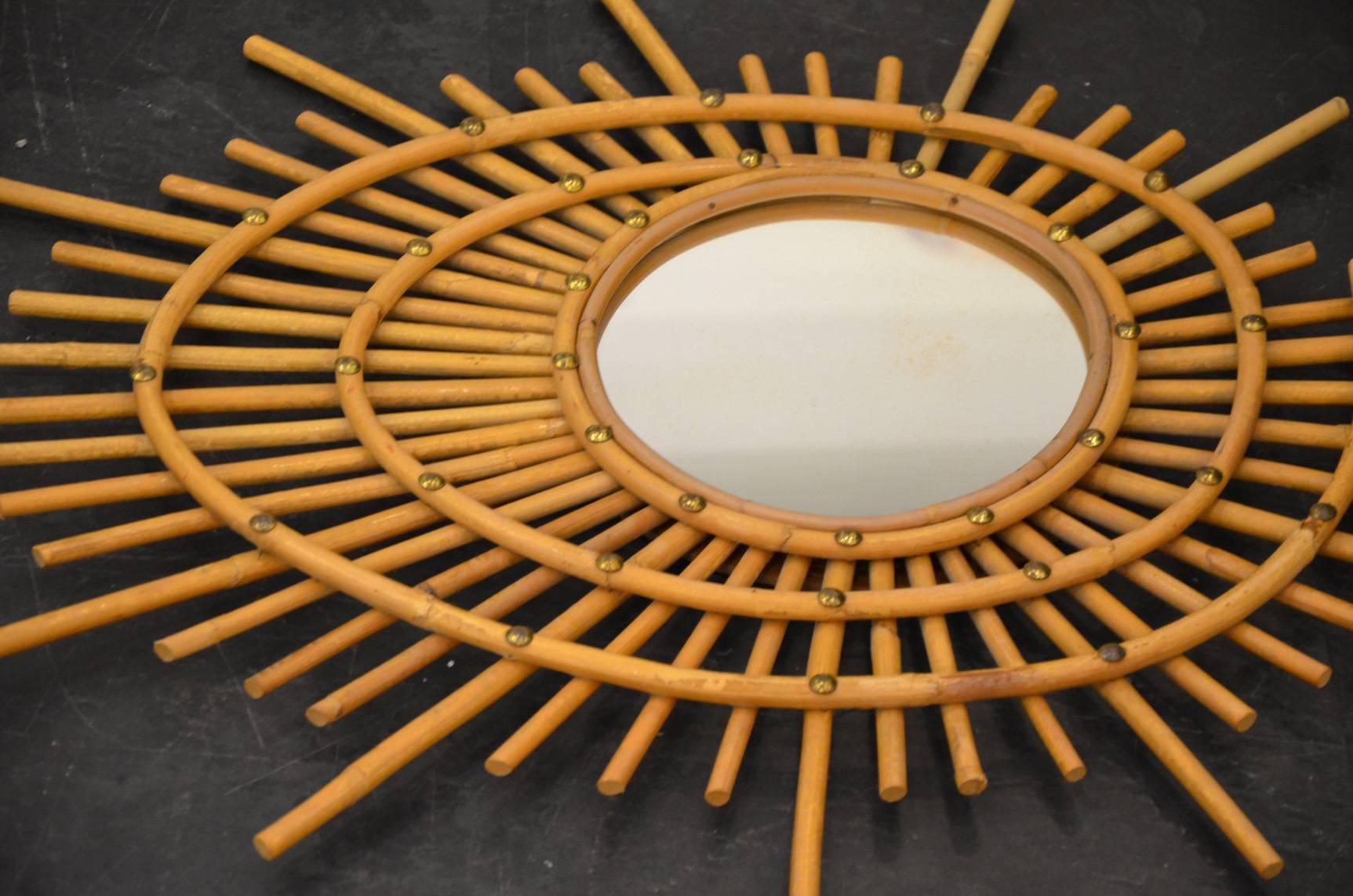 Beautiful set of four Italian wicker mirror, circa 1960. Excellent condition
from 40 to 60cm diameter.