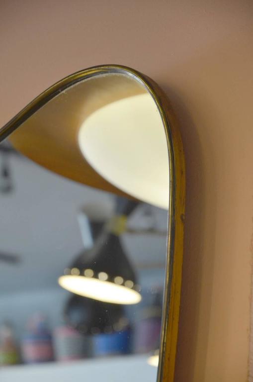 Beautiful Italian brass mirror, circa 1960.