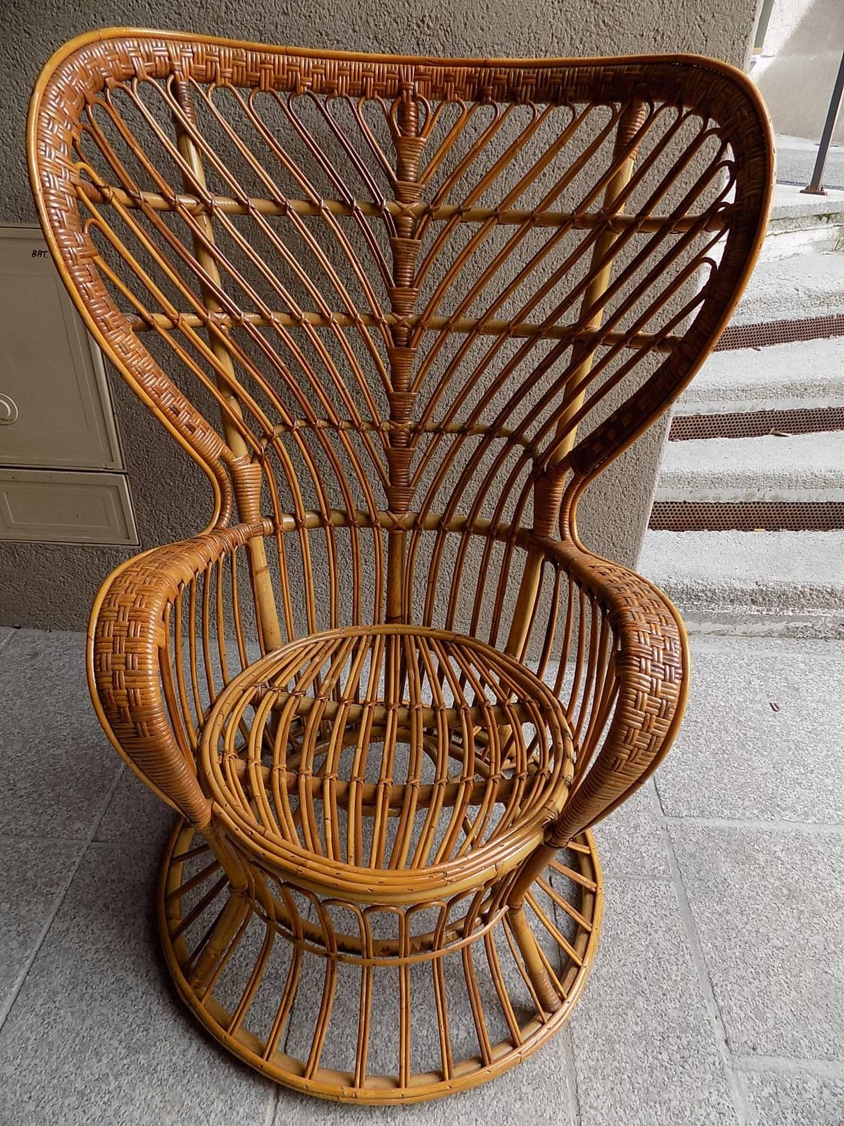 Fantastic pair of Lio Carminati wicker armchairs, designed 1946, this example produced circa 1960. In excellent condition.