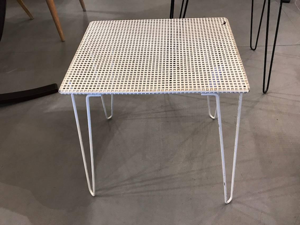 Beautiful set of two steel tables in the taste of Mategot, circa 1960. In good condition.