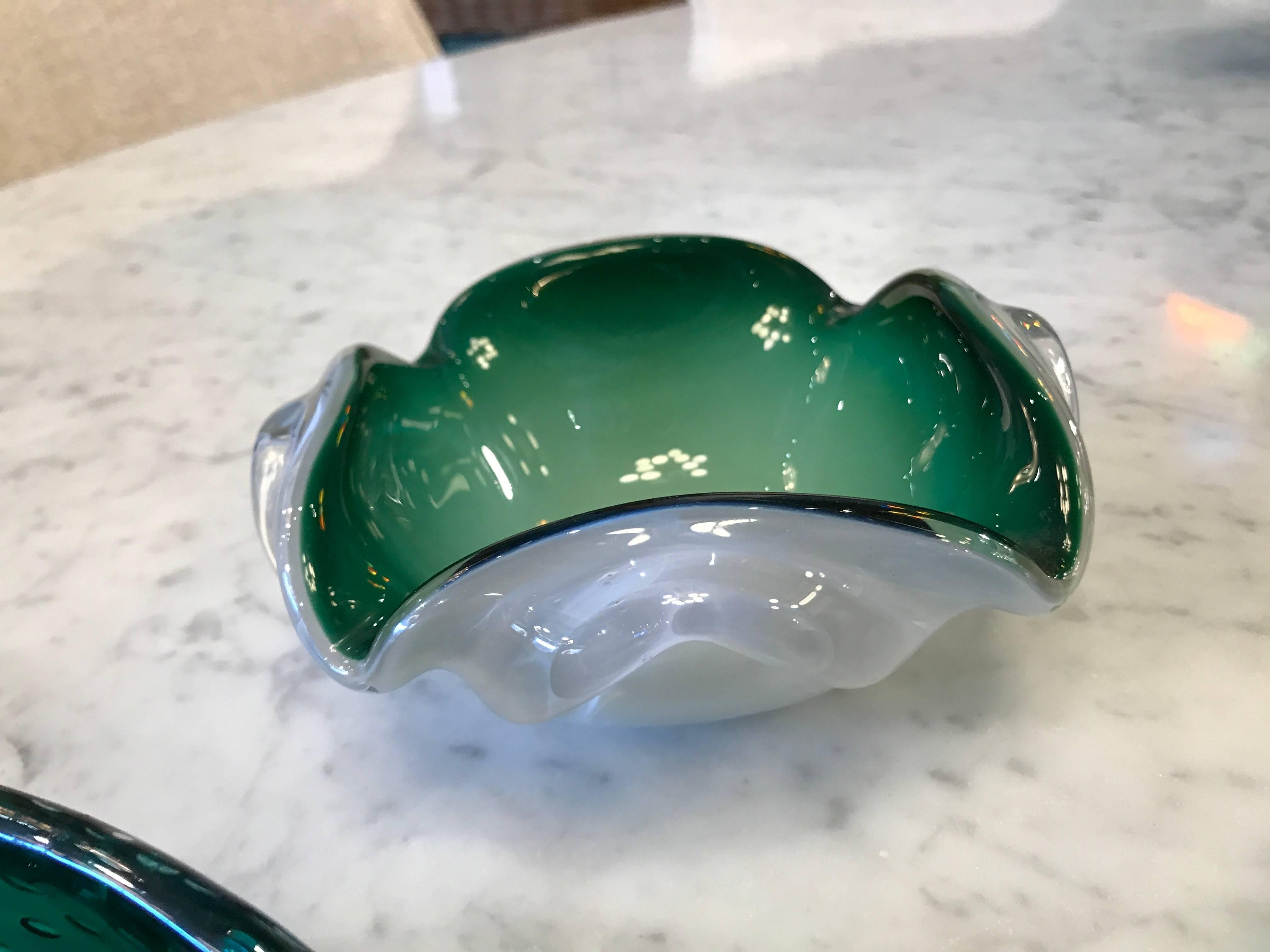 Beautiful set of three green Murano ashtray, circa 1960. Very good condition.