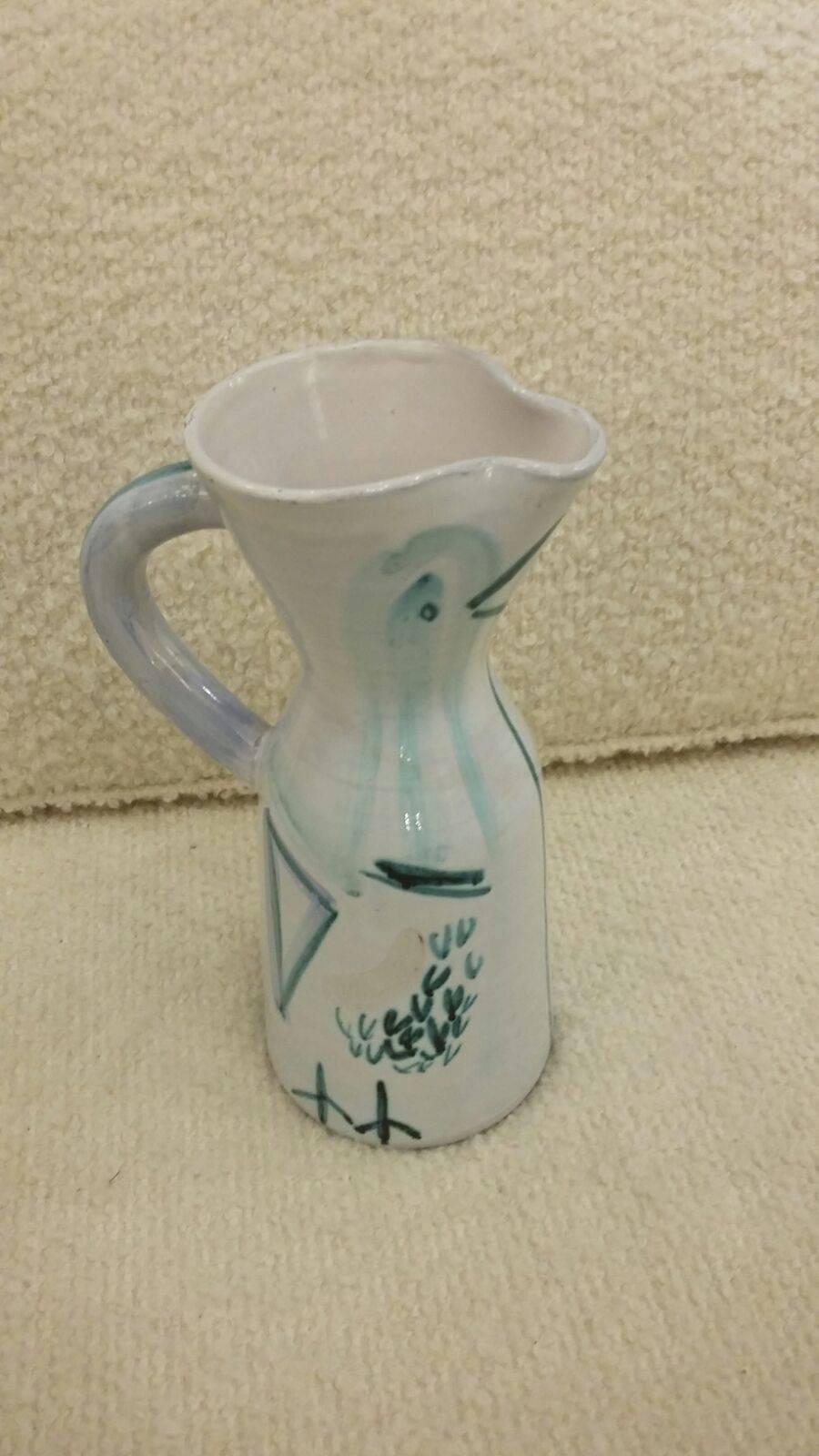 Beautiful Jacques Innocenti ceramic pitcher, Vallauris, circa 1960, signed,
in excellent condition
Measures: H 29 cm, D 12 cm, L with pitcher's handle 20 cm.