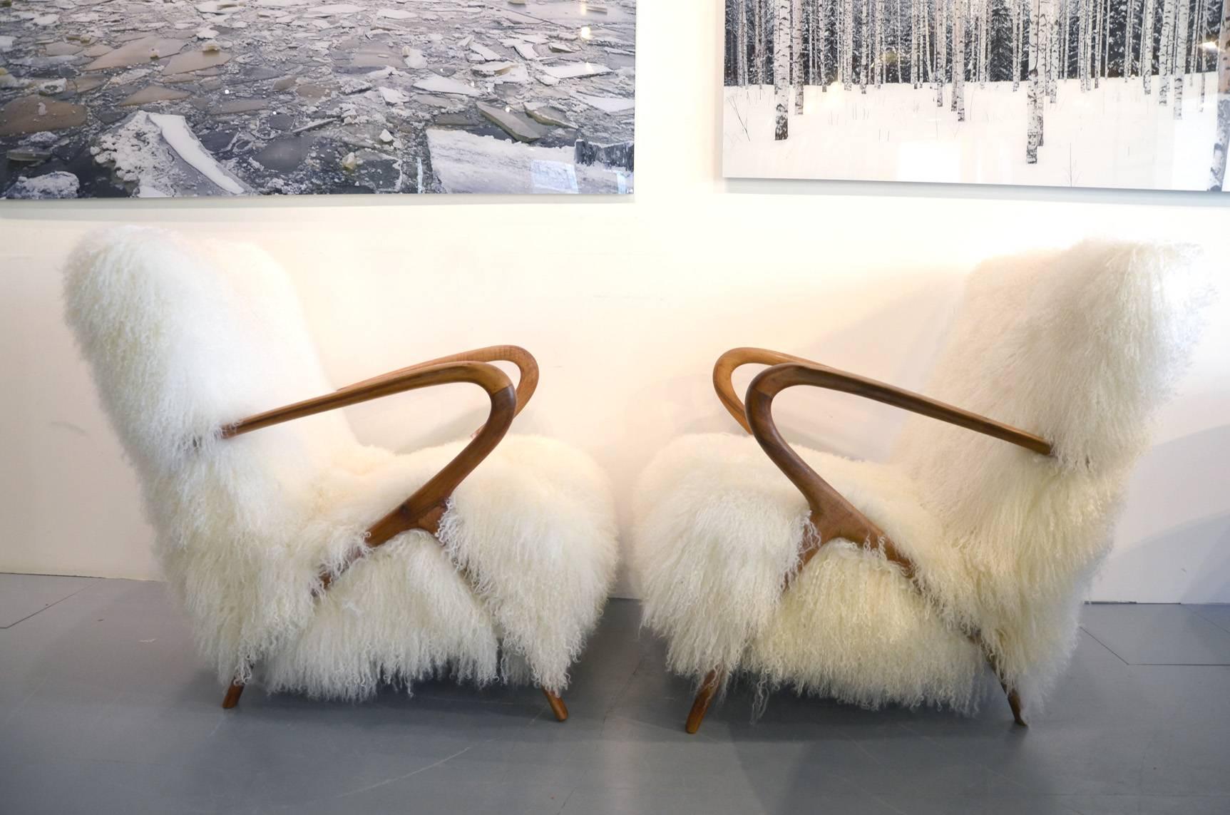Beautiful pair of Italian armchairs reupholstered in Tibetan lamb.