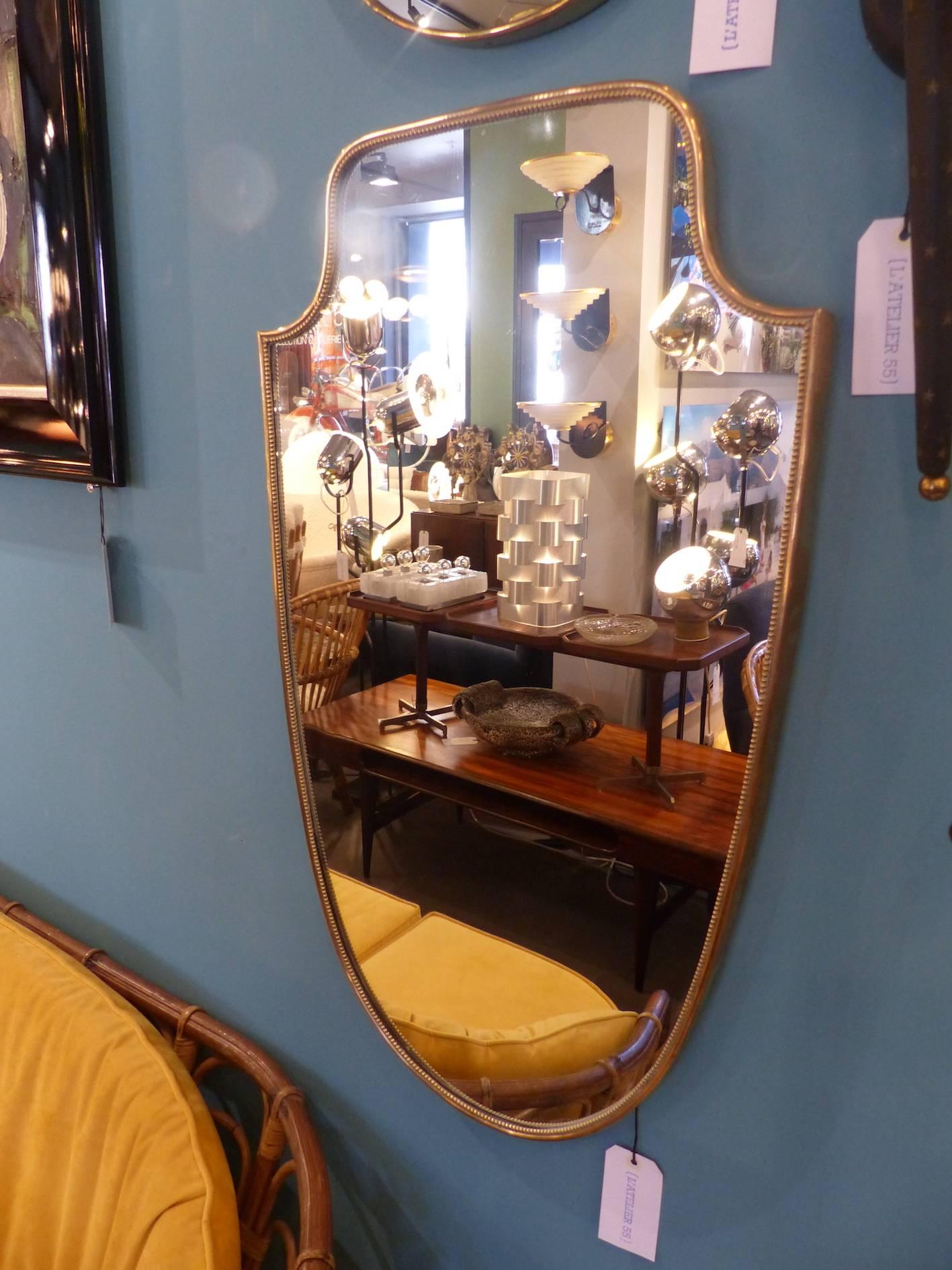 Beautiful Italian brass mirror, circa 1960, in excellent condition.
