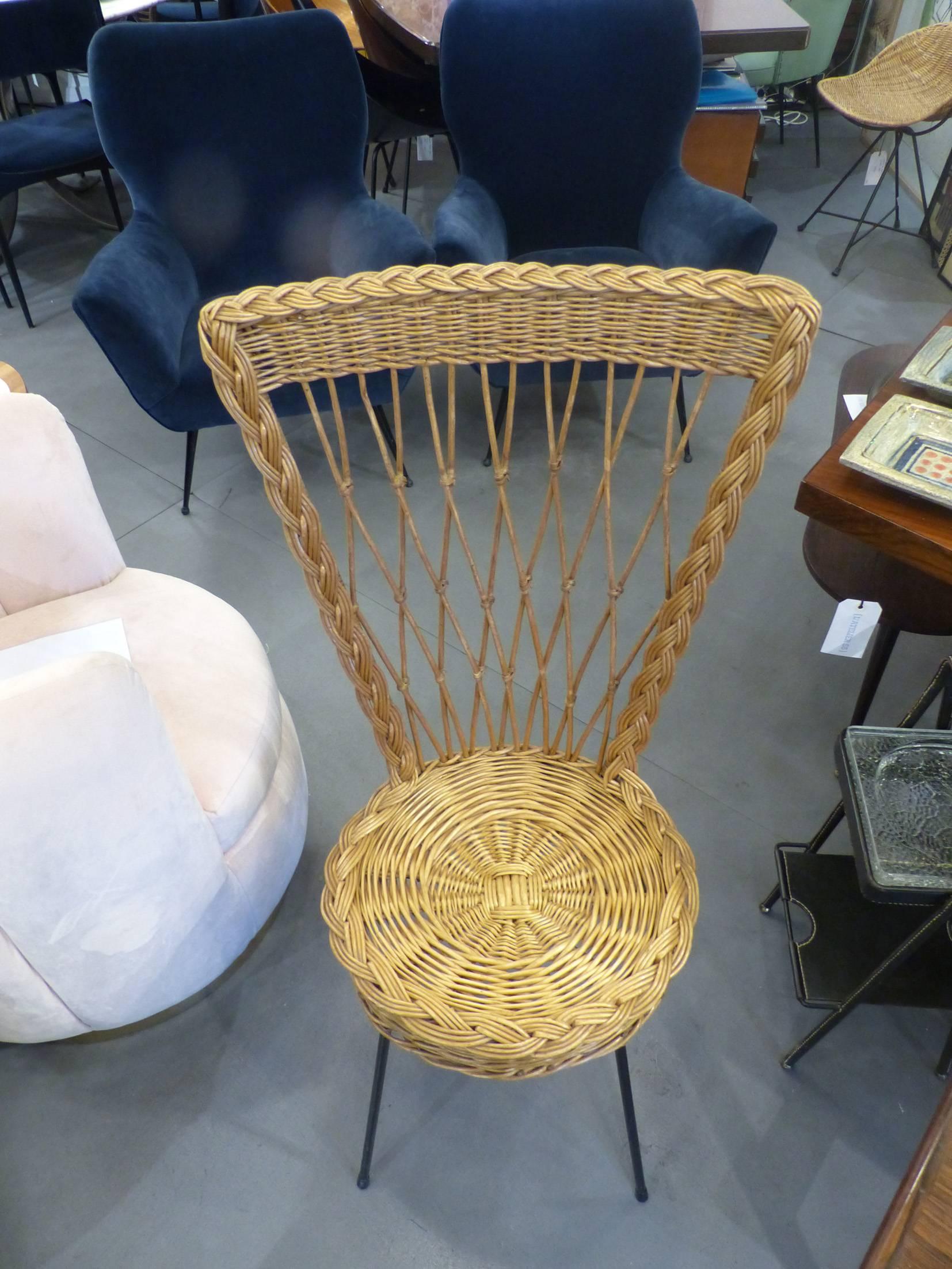 Beautiful pair of 1960 French wicker chairs. Excellent condition.