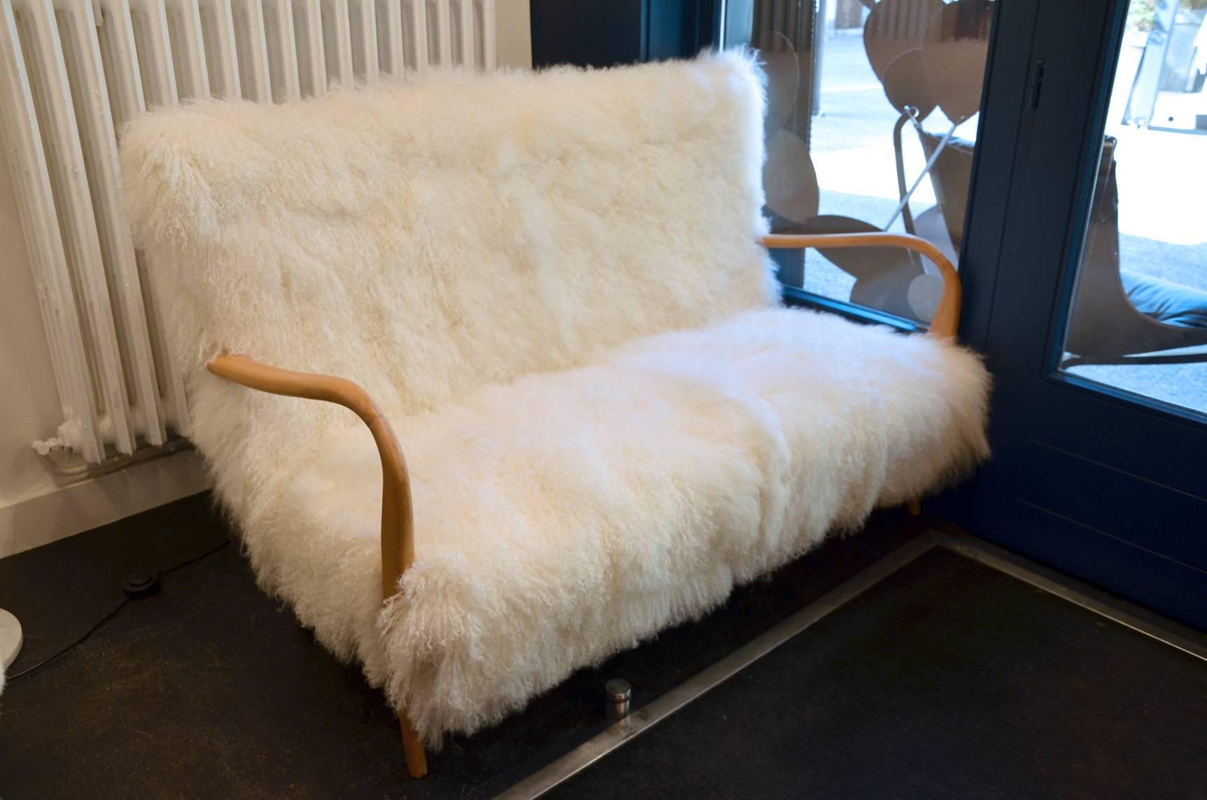 Beautiful Tibet Lamb fur reupholstered Italian sofa in perfect condition.