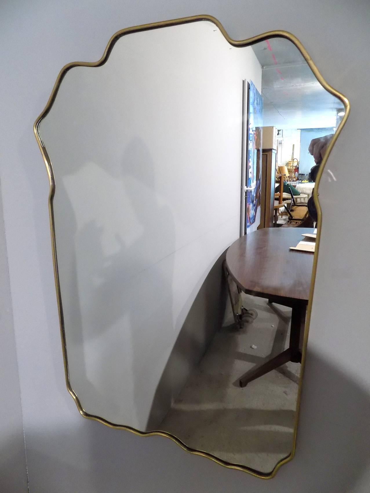 Huge Italian 1960 free-form brass mirror.