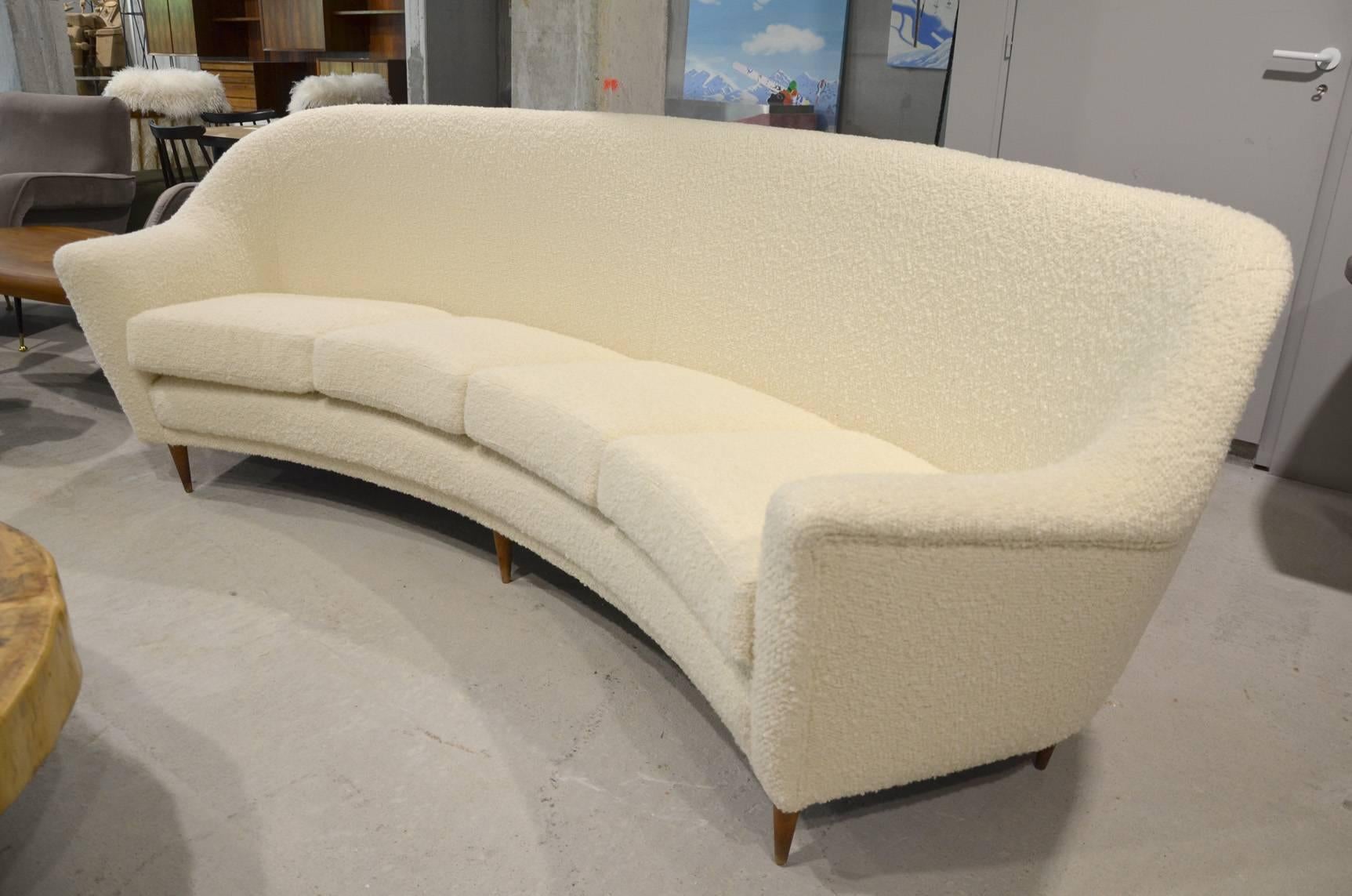 Fantastic pair of Italian reupholstered sofas. Reupholstered in a white wool fabric.