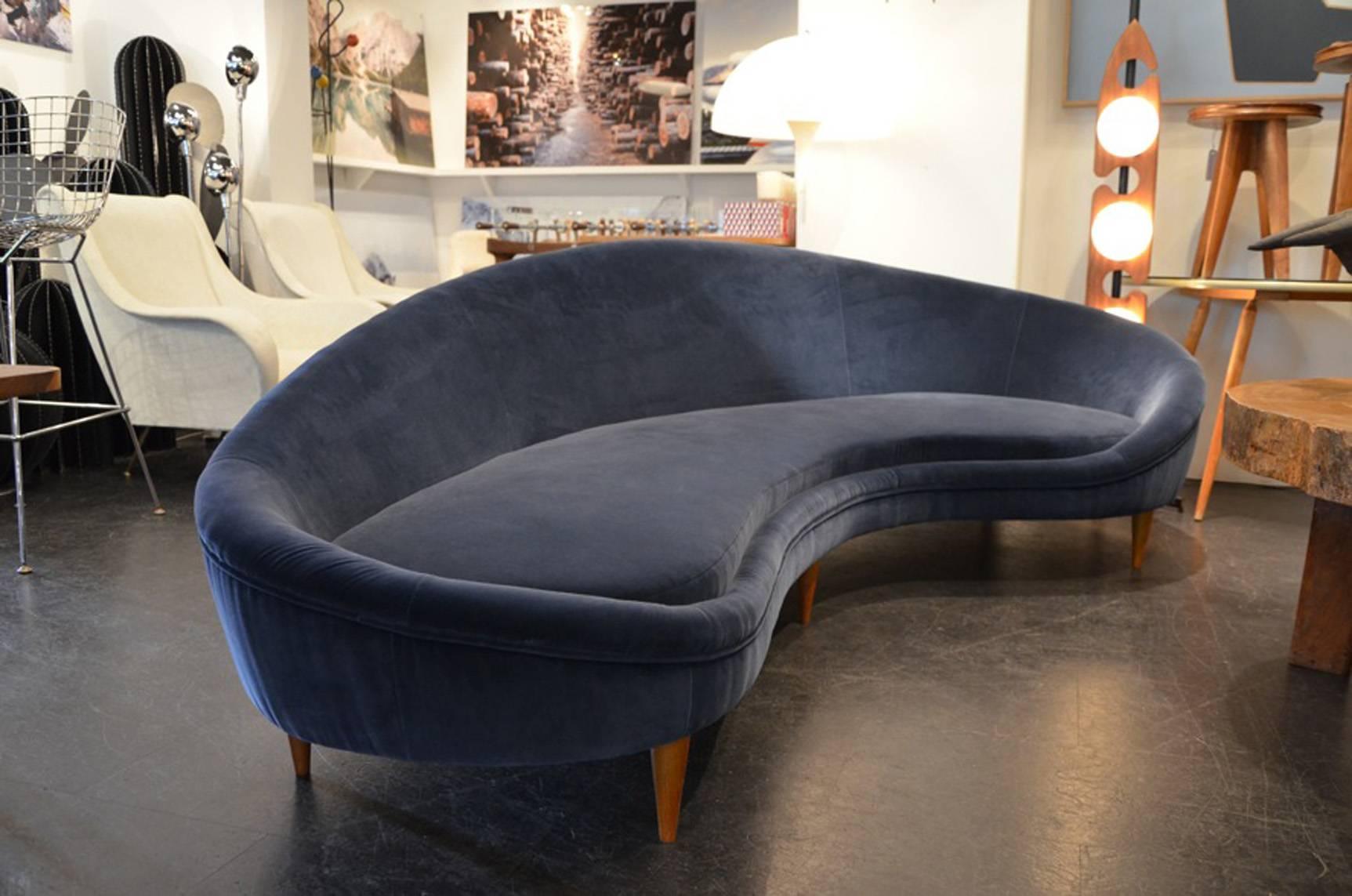 Huge Pair of Italian blue Velvet Sofa with wooden feet.
