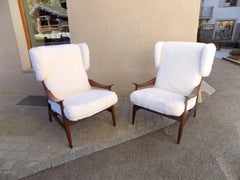 Beautiful Pair of vintage Scandinavian Armchairs reupholstered in a Sheep Fur