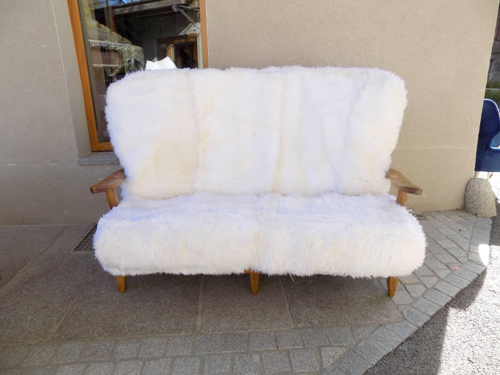 Beautiful Guillerme et Chambron sofa. Reupholstered in a sheep fur.