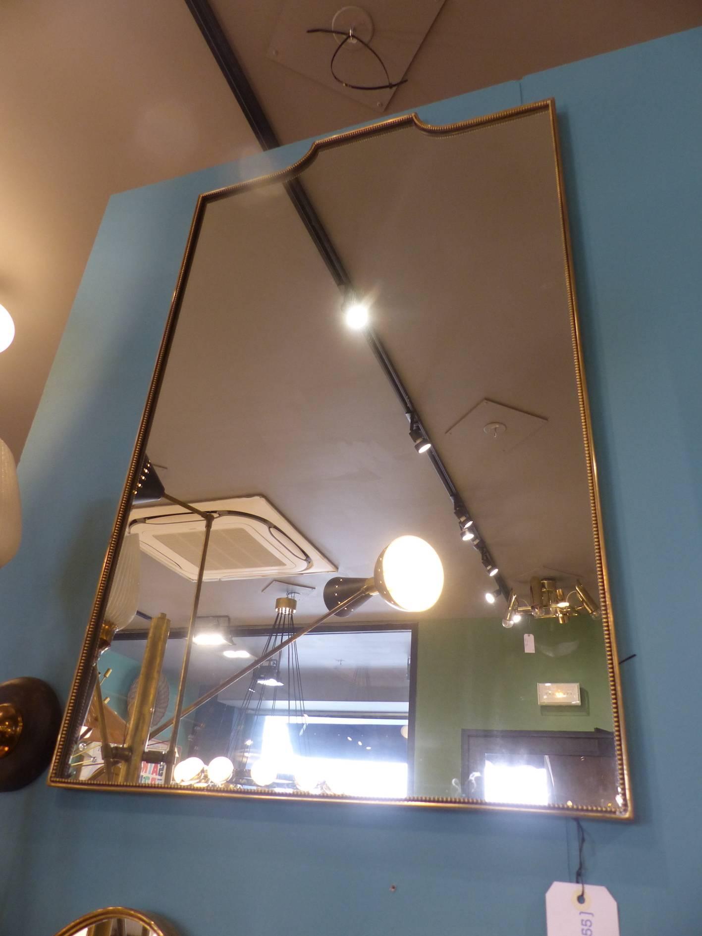Beautiful Italian brass mirror circa 1960, in excellent condition.