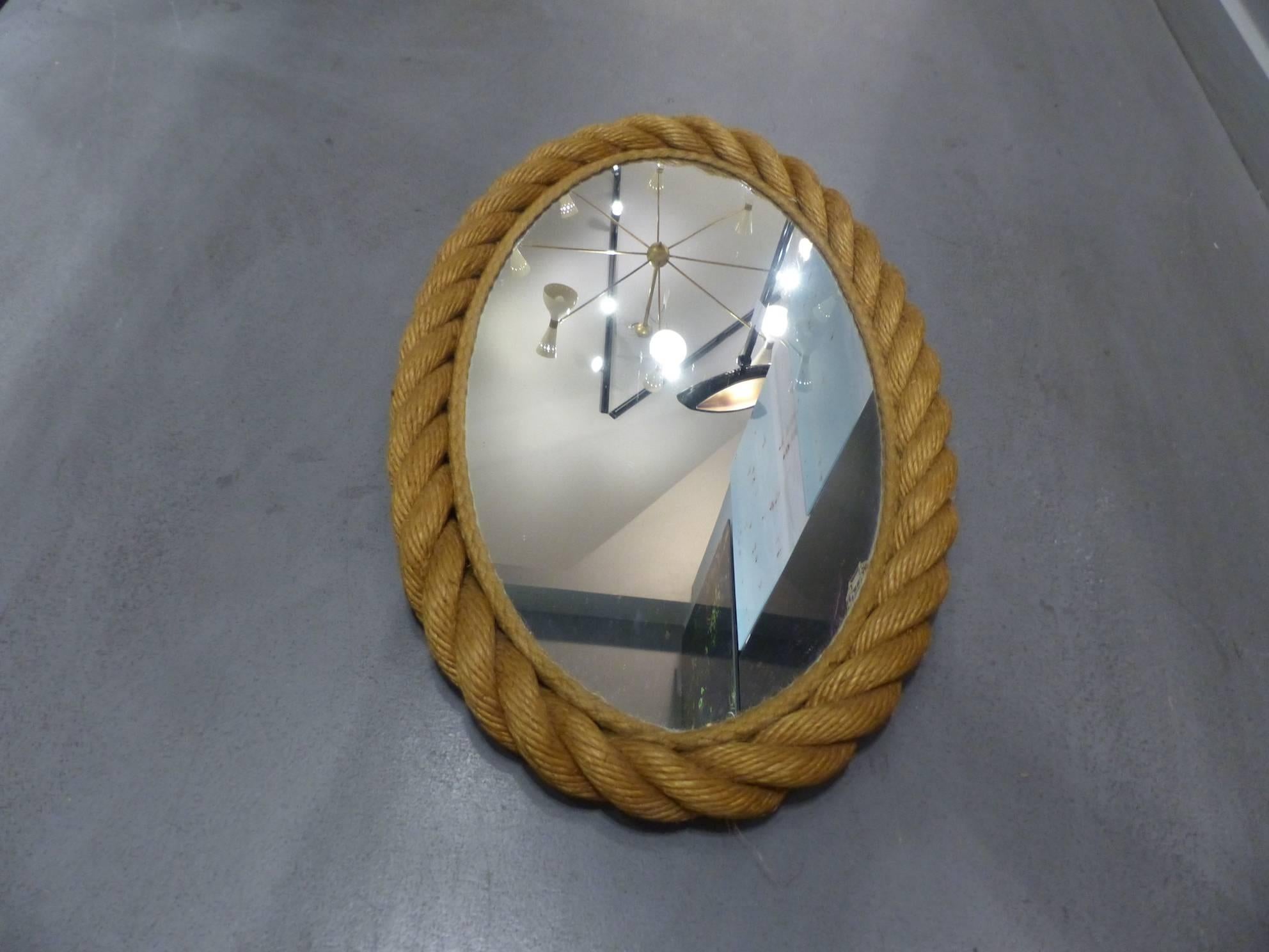 Beautiful Adrien Audoux and Frida Minet rope oval mirror, circa 1960.