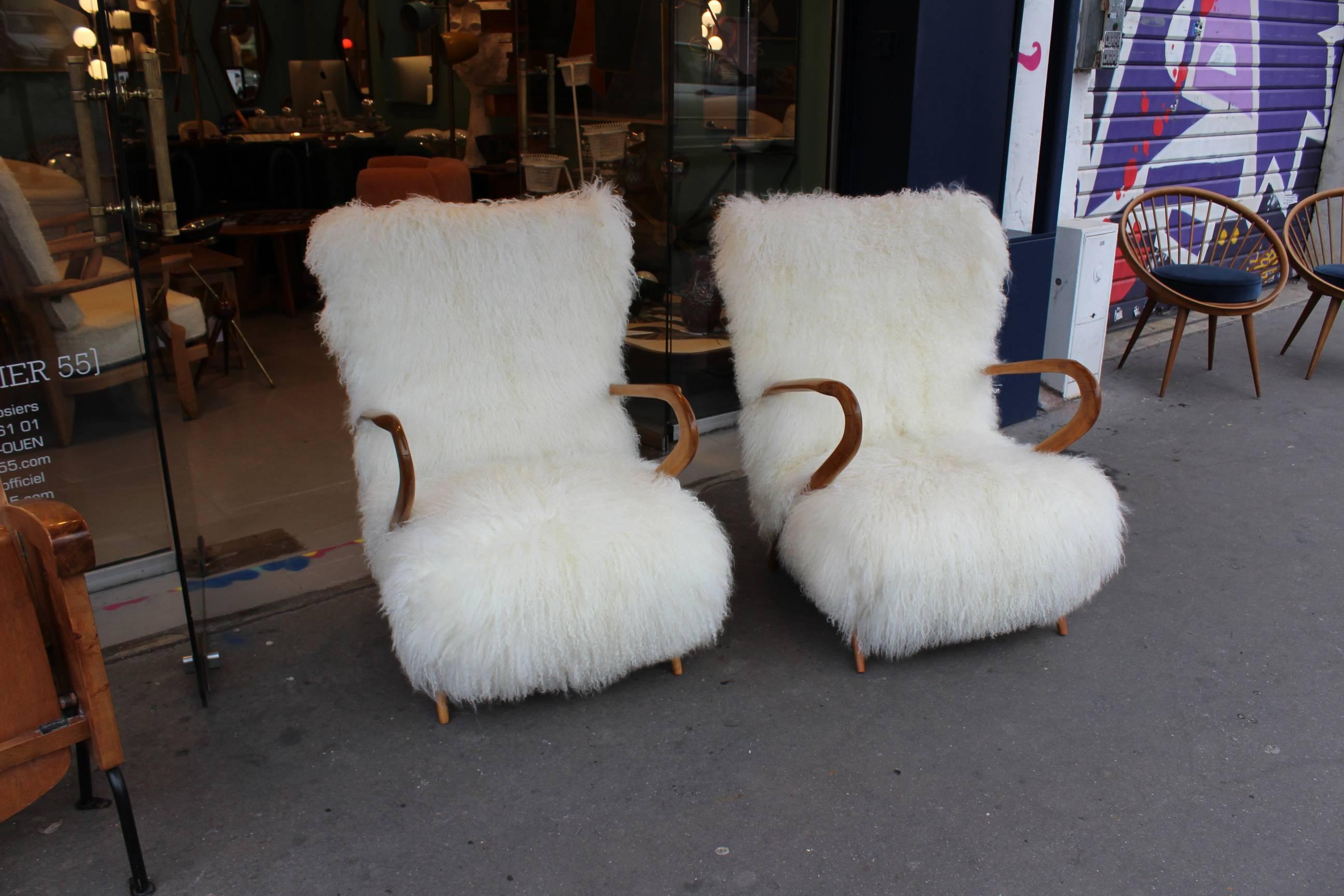 Pair of Italian reupholstered armchairs by Gugliermo Ulrich, circa 1960.