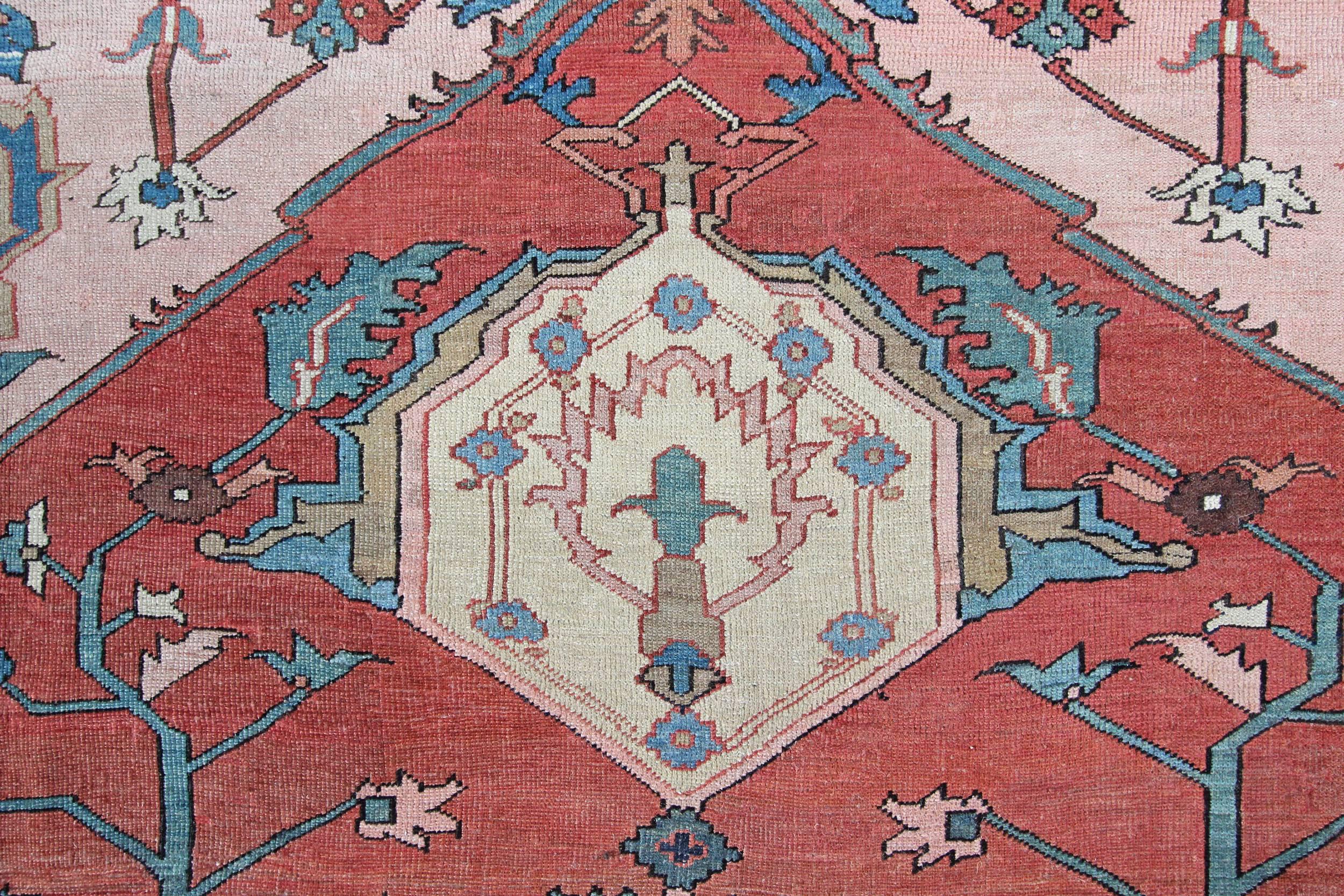 An antique Bakshaish carpet with exquisite colours and design. More often Bakshaish carpets were woven in larger sizes and always with bold geometric designs, and vivid colours. Their designs can be quite abstract and nearly always comprised of a