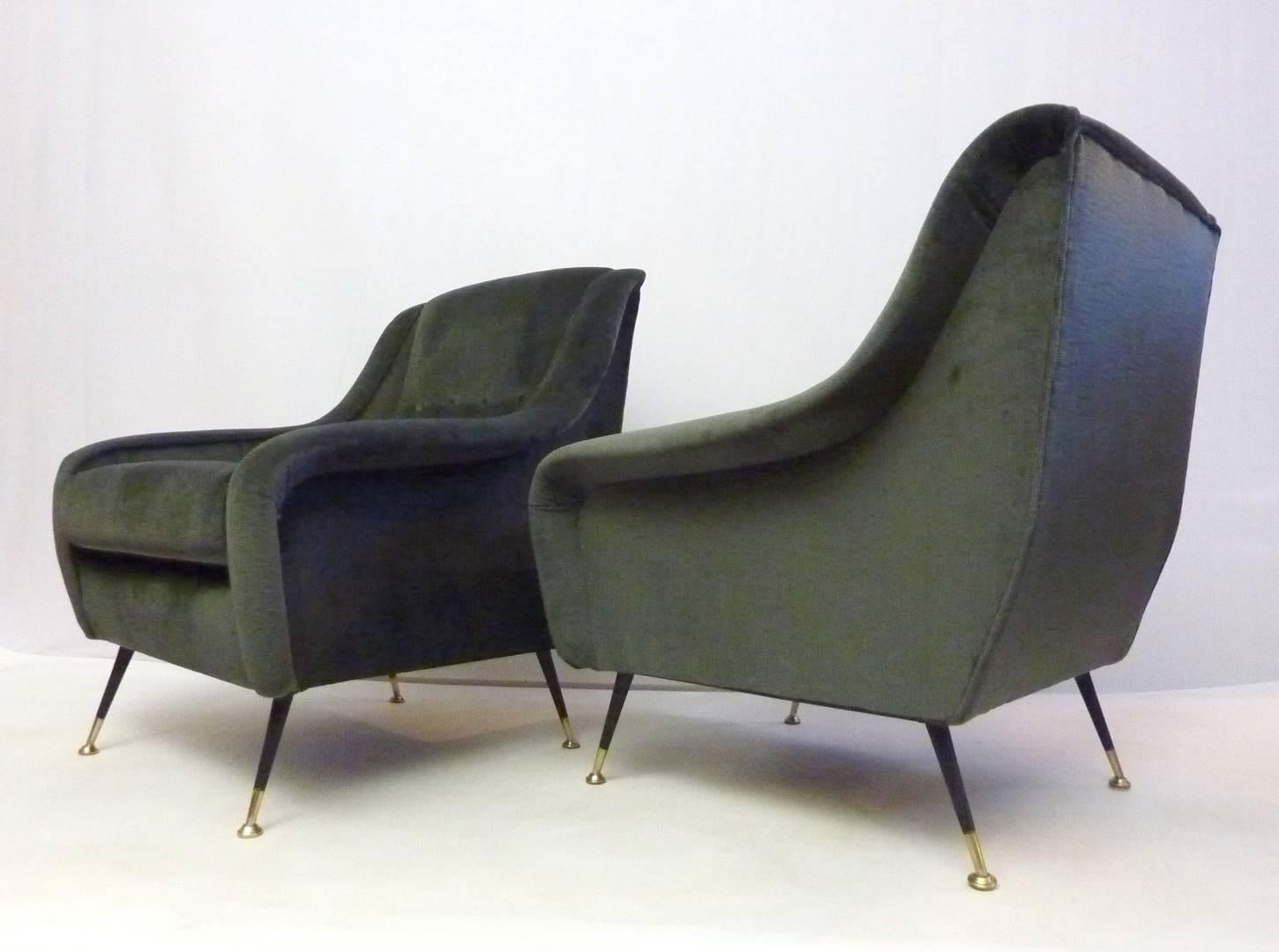 A pair of very comfortable armchairs designed by Carlo di Carli, Italy during the 1950s. Has recently been professionally reupholstered in a silky charcoal gray linen velvet.