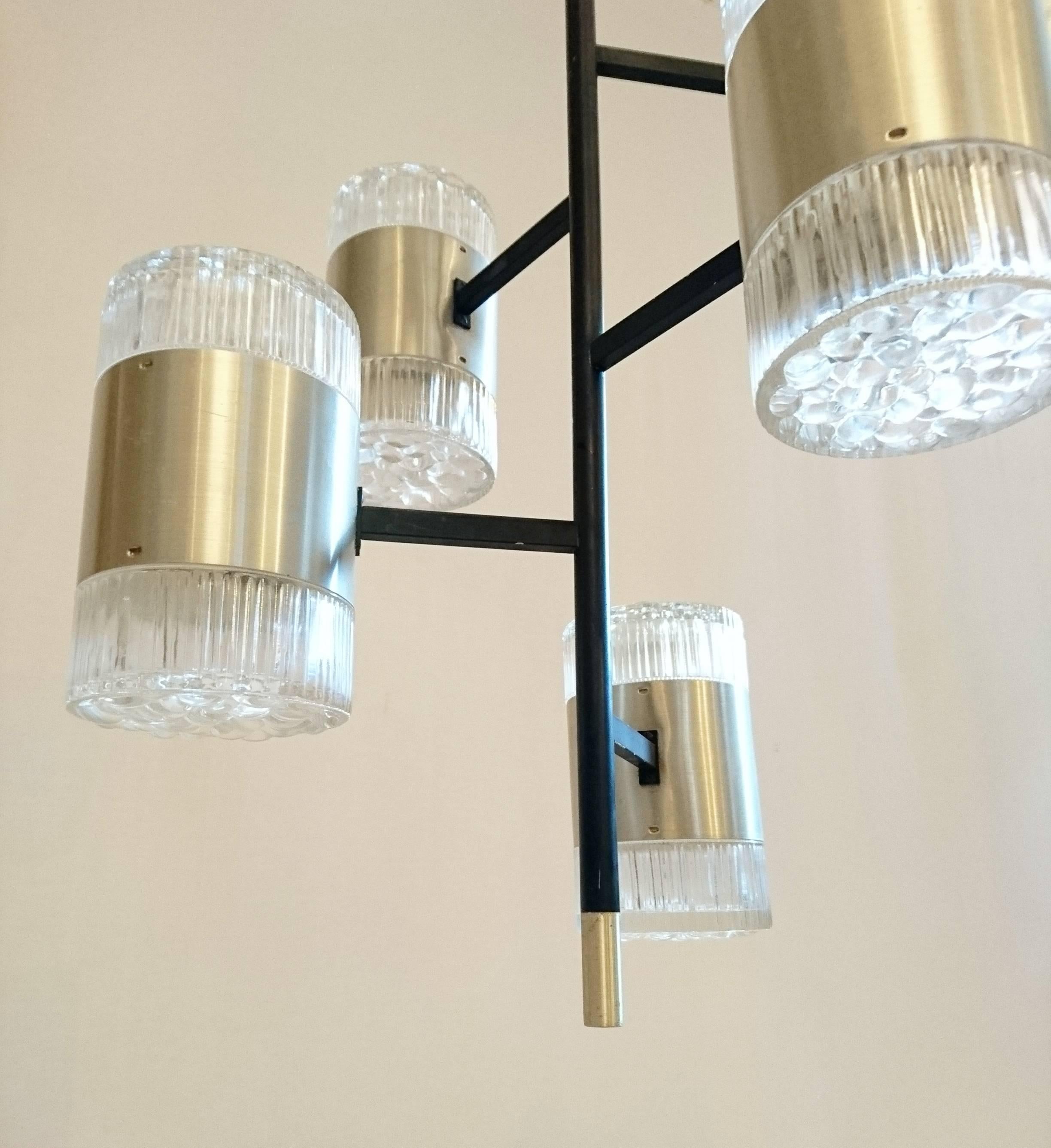Modernist style ceiling lamp excellent for narrow spaces. Each lantern has two sockets so all in  all there is room for 12 lightbulbs.