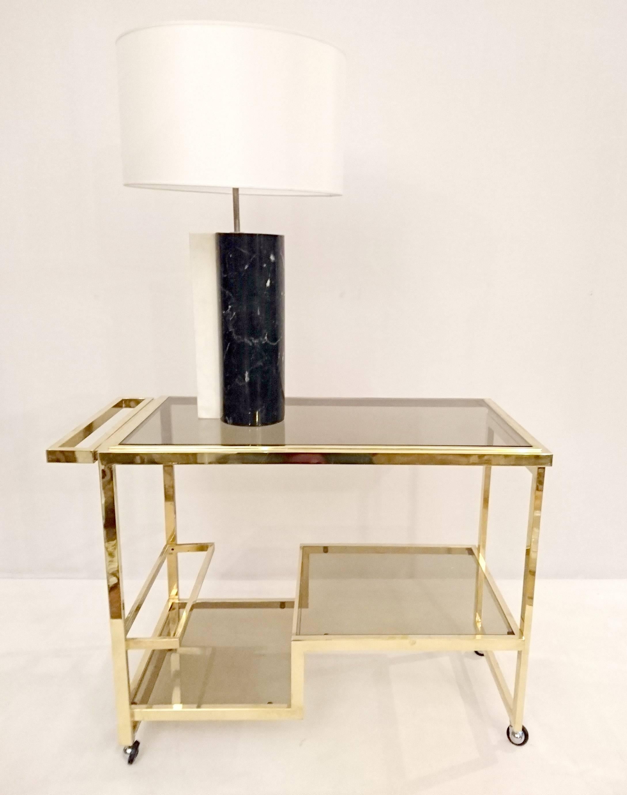 Ultra glam table lamp in black Madagascar marlble and white Carrara marble in a striking but simple design.