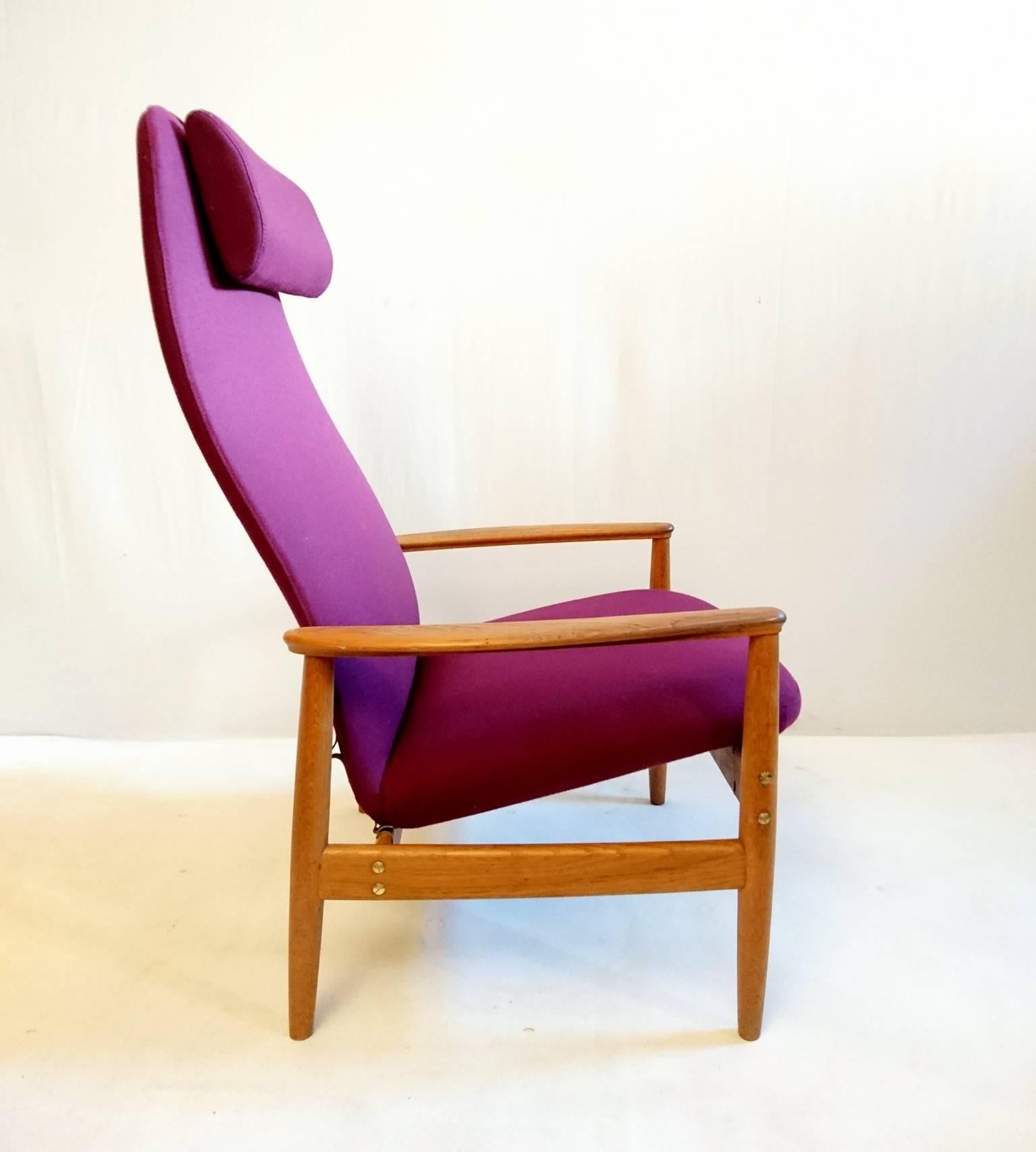 Armchair model "Contour-Set 327" by Alf Svensson for Bra Bohag, Ljungs Industrier AB, Sweden. Can be adjusted for two different positions. Completely professionally refurbished and reupholstered in an Italian plum colored virgin wool.