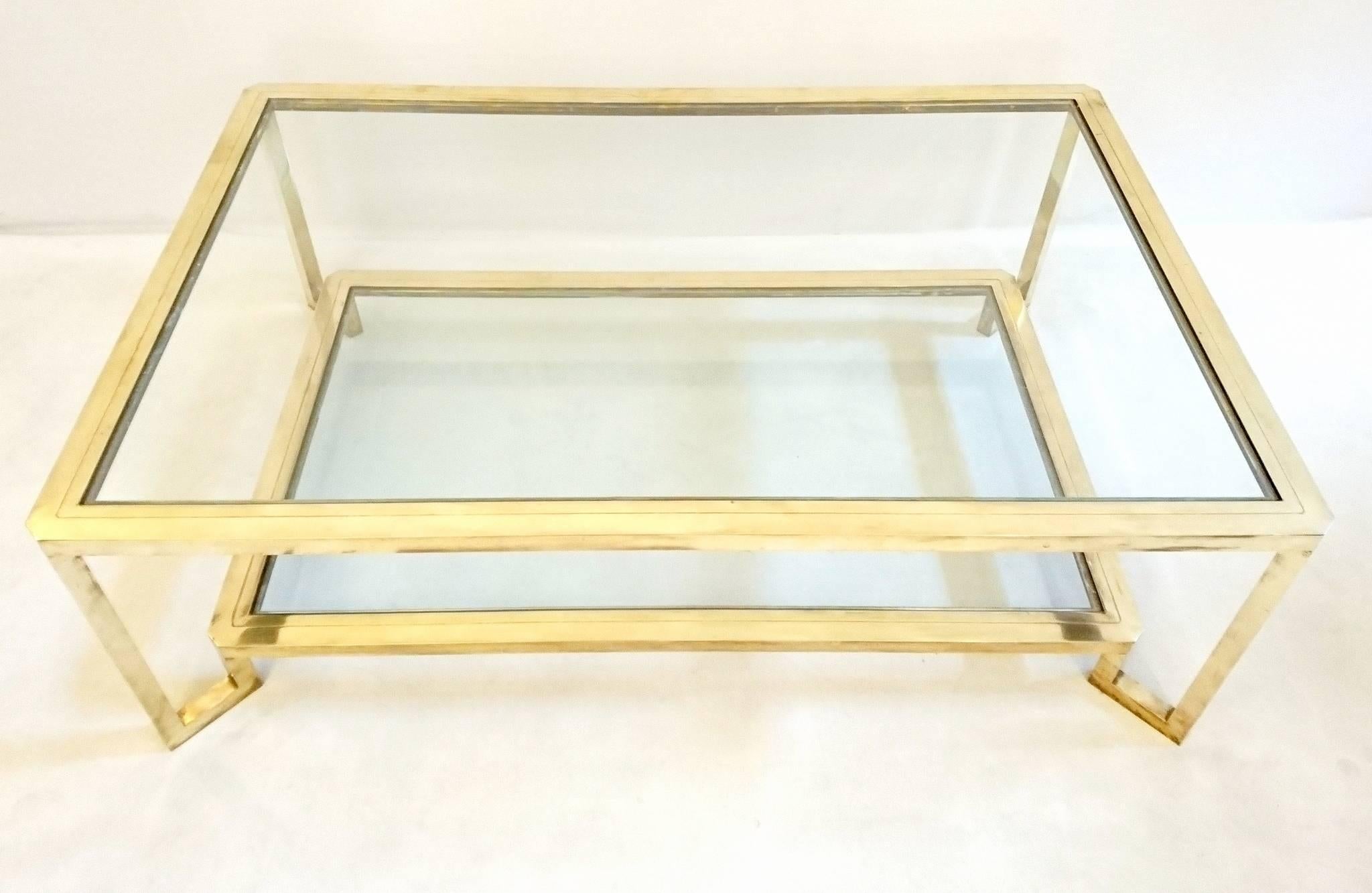 High quality table in brass in two levels with beveled corners.