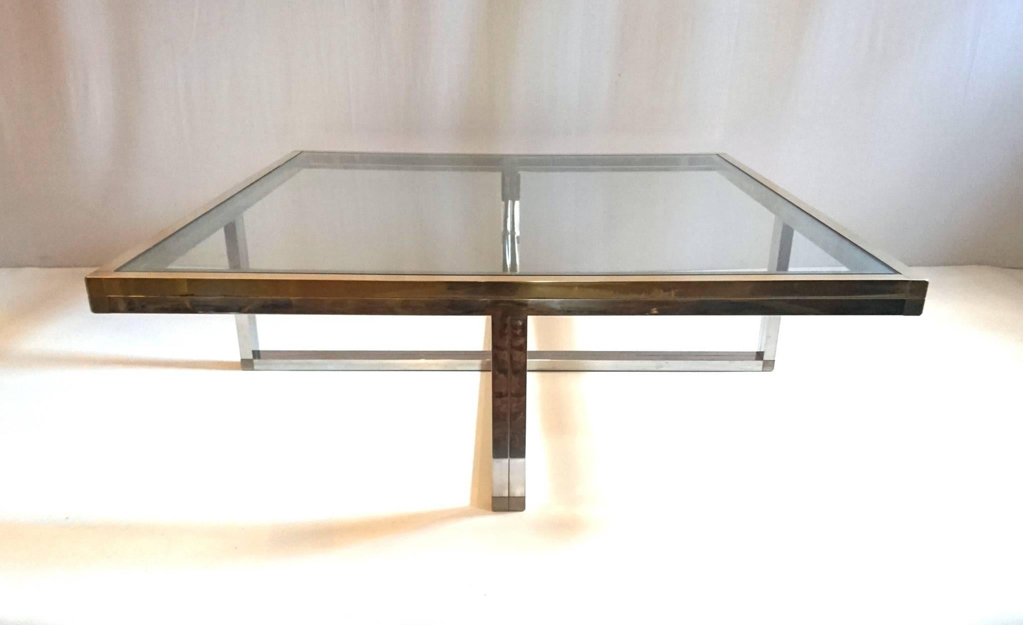 Coffee table in Classic Romeo Rega design in brass and chrome with a clear glass top. Excellent quality and stability.