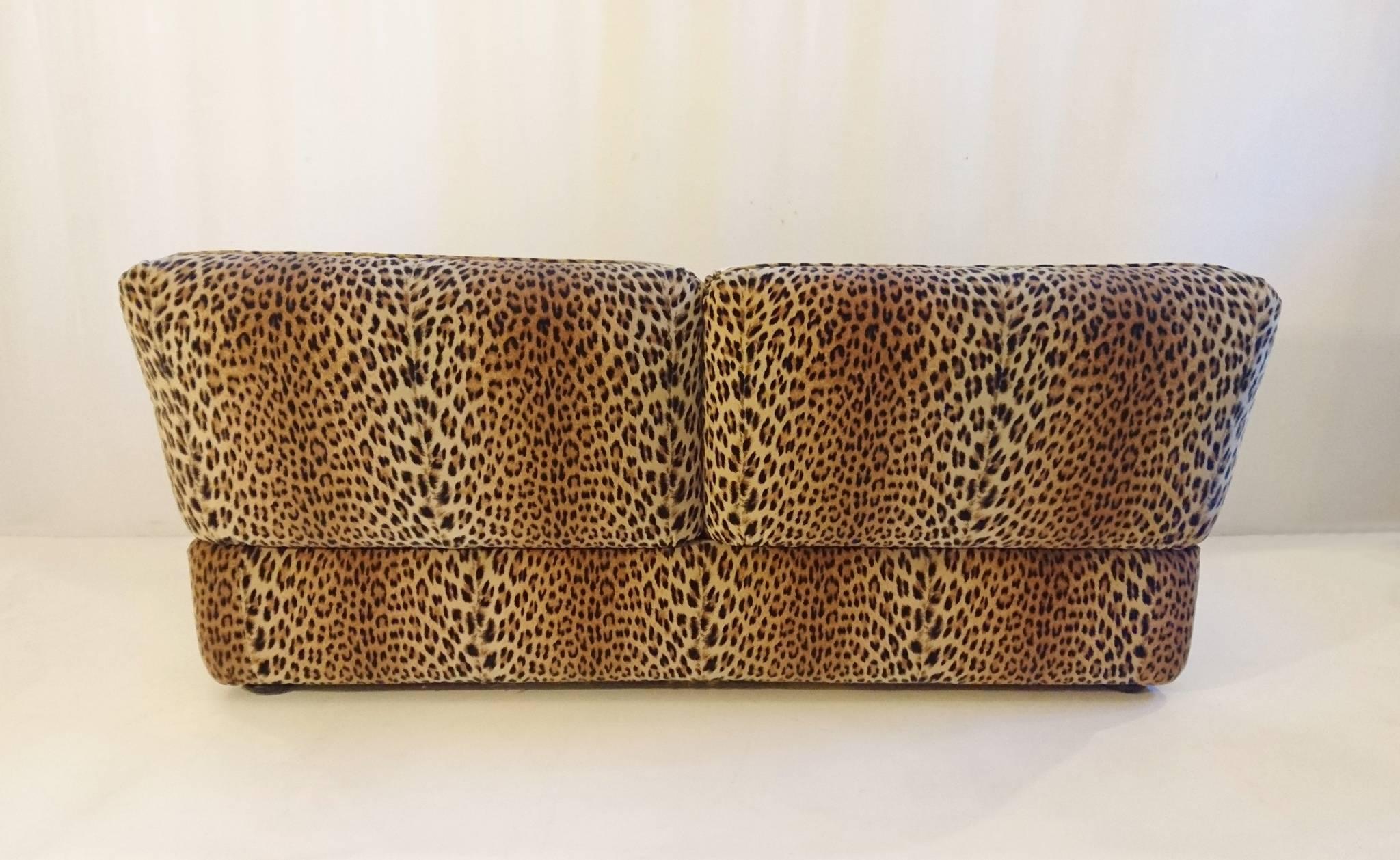 An exceptionally cool vintage sofa by Italian brand Cyrus Company that is still in existence today. The sofa is in excellent condition and very plush and comfortable. Cushions are not flat or deflated. No visible stains wear or tear to the velvet
