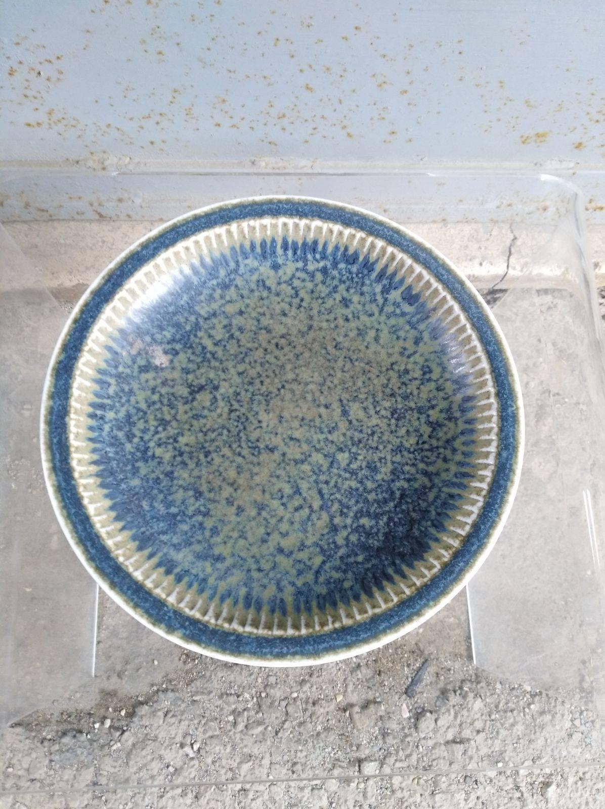 The glaze is very beautiful in the colors of blue harzefur.
Signed with the R with Three Crowns for Rörstrand, Carl-Harry Stalhane, Sweden and SGX for the model of the bowl.