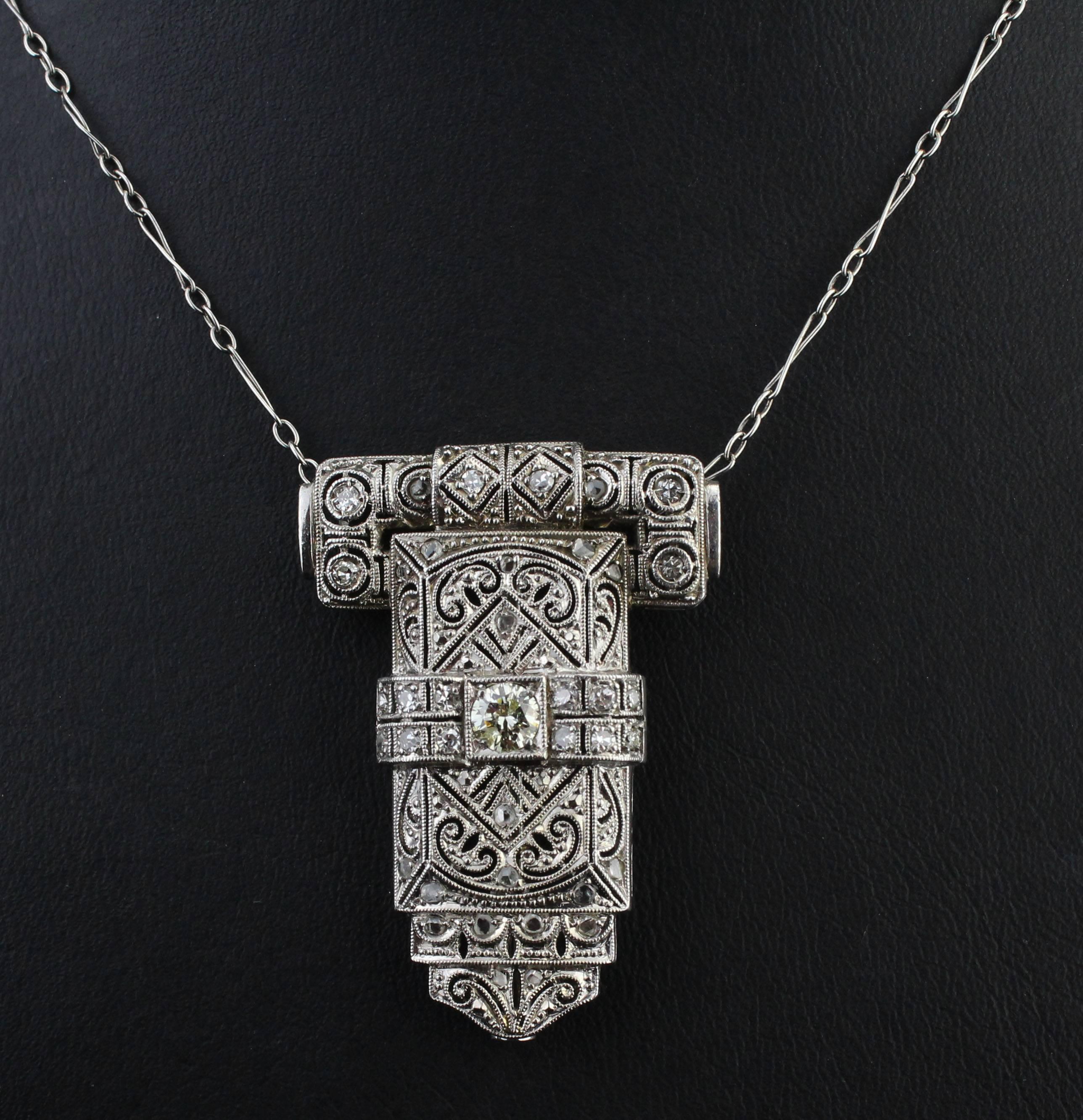 Art Deco,  circa 1920/1930.
Platinum.
Pendant with brilliants. 
Pendant measures: Height 3.5 cm, width 3 cm, depth 0.6 cm.
Length of necklace: 39 cm.

I provide for packing of the goods. So no need to worry about damages, scratches etc.