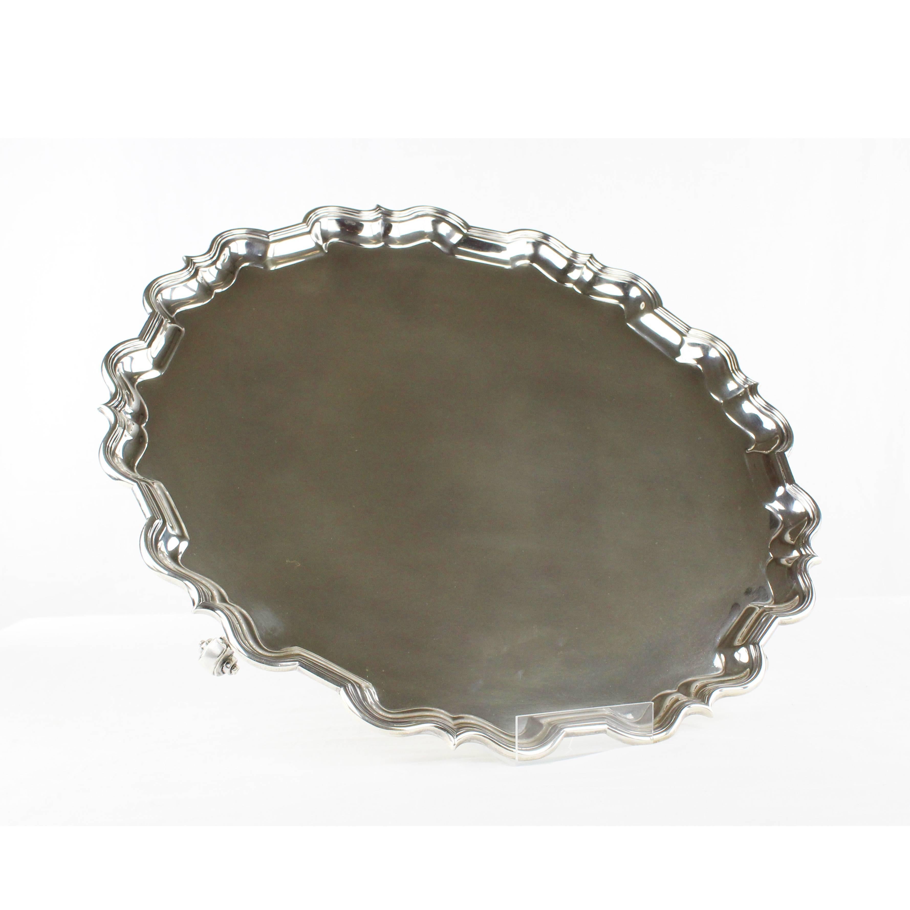 Heavy and large Sterling silver tray
England, London 1930
Three small state feet
925 sterling silver, hallmarked
Height 4.7 cm, diameters ca. 45 cm

Delivery can be made to your door within 7 days worldwide. We already delivered to Asia, US and a