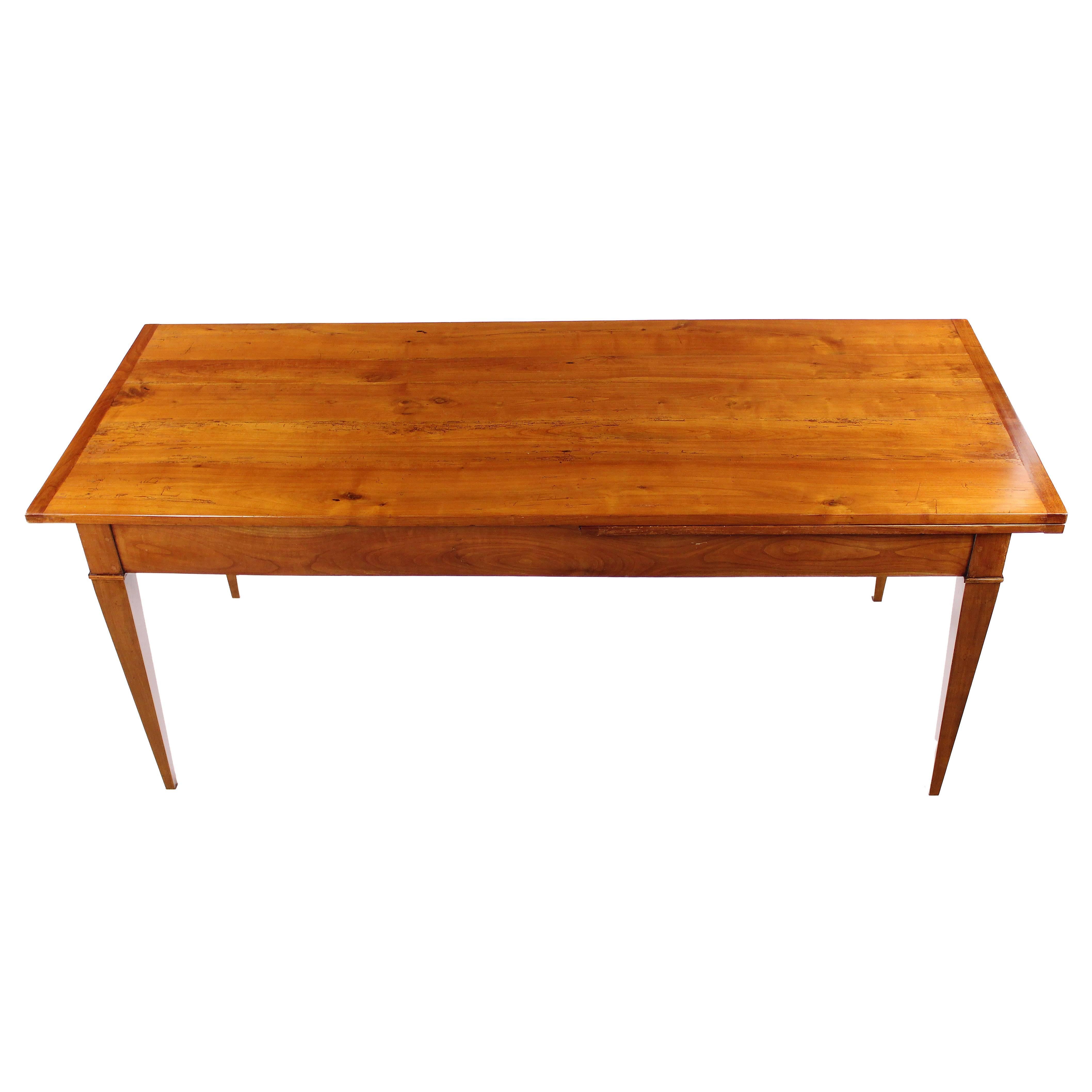 France, circa 1830-1840
Massive cherry tree
Unilaterally extendable with additional foot
Sharp running up square legs
At the side a drawer
Restored state, wax polish
Measures: Height 82 cm, length 200 or 293 cm, depth 83 cm

Delivery can be