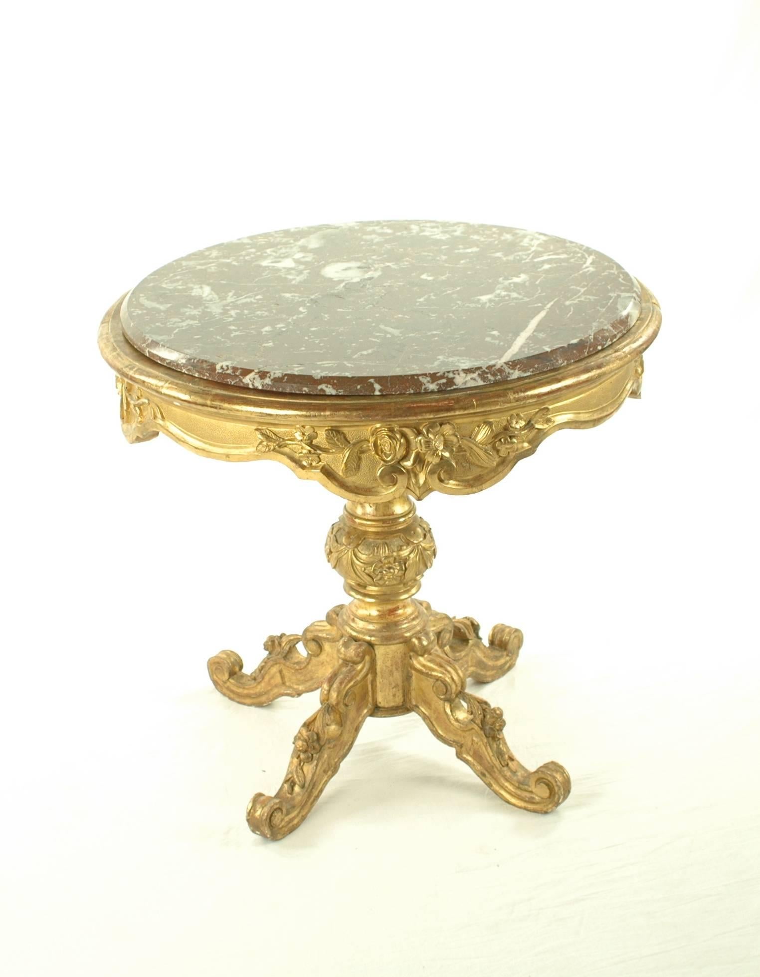First half of the 19th century
Rococo style
Marble top
Wood, golden-colored
Measures: Height 70.5 cm, diameters 74 cm

Delivery can be made to your door within 7 days worldwide. We already delivered to Asia, US and a lot of European countries.