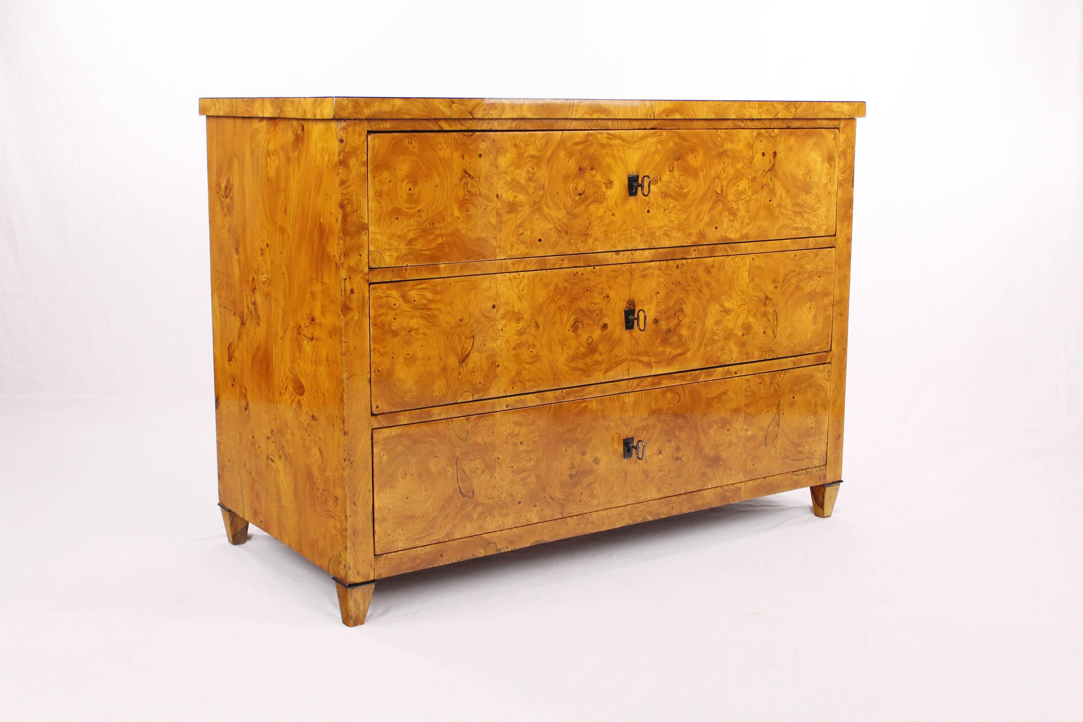 • Biedermeier period chest of drawers, circa 1820
• Ash root wood veneered
• 3 pushes
• Partly ebonized
• Restored residential-ready state
• French shellac hand polish
• Height: 79.5 cm, width: 107.5 cm, depth: 52.5 cm

Delivery can be made