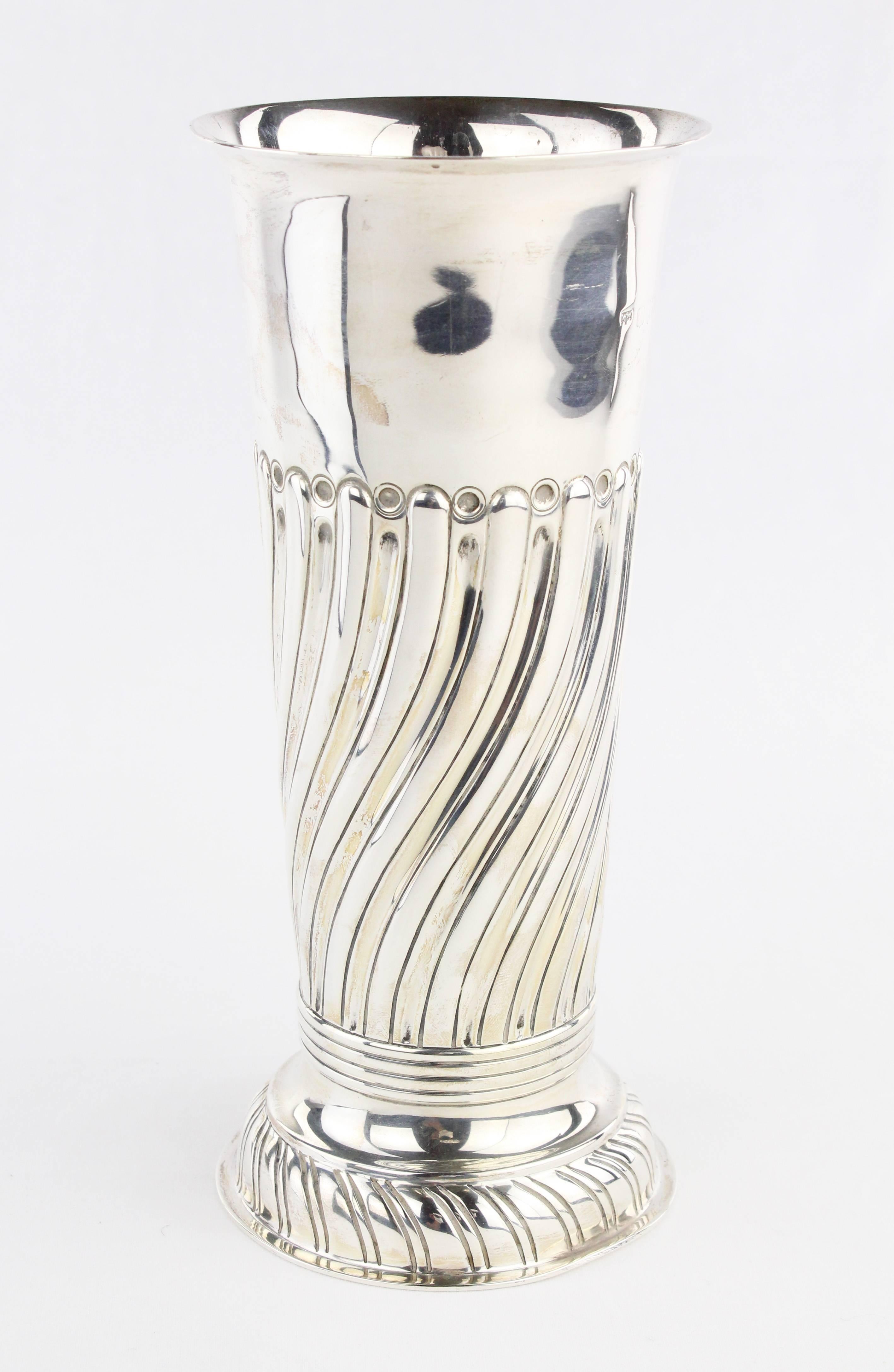 • Vase, England, London, 1893
• 925 sterling silver
• Hallmarked
• Height: 22 cm, diameters foot circa 9.5 cm, diameter opening circa 9.5 cm

Delivery can be made to your door within 7 working days worldwide. We already delivered to Asia, US