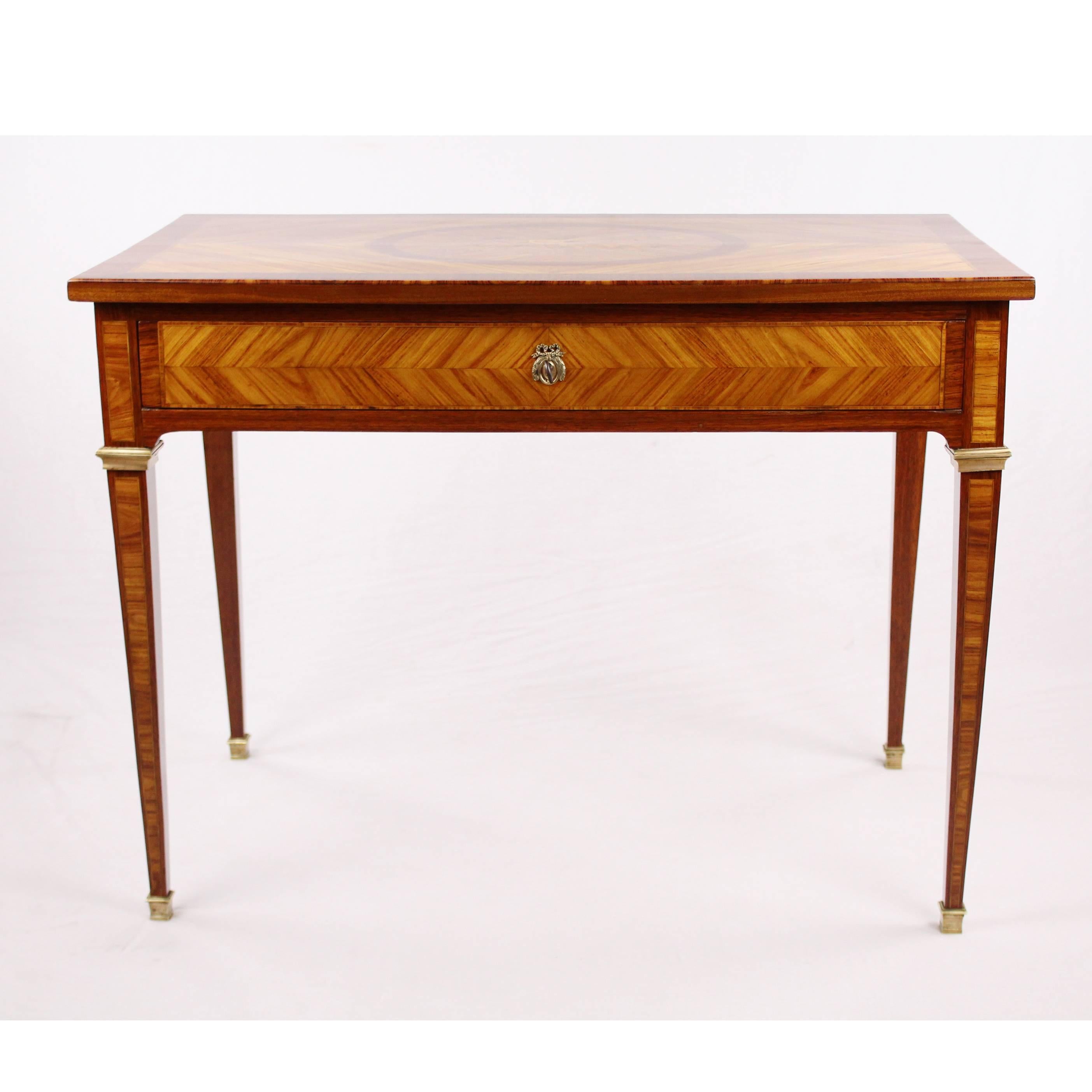 • Nice early 19th century side table
• Empire, France, circa 1800-1810
• Rosewood
• Skilfully veneered
• Medallion with floral inlaid work
• One push
• Restored residential-ready state
• French shellac hand polish
• Measure: height 75 cm,