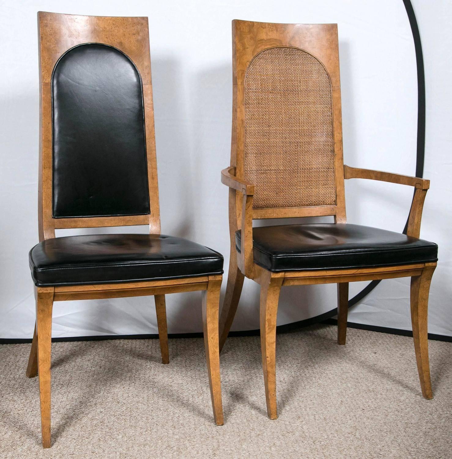 Eight Mastercraft burl wood and black vinyl Mid-Century Klismos dining chairs. Ebony inlay and beautiful burl makes this set of eight special for sure. The armchairs are sturdily double caned and the sides are framed in burl and ebony with black