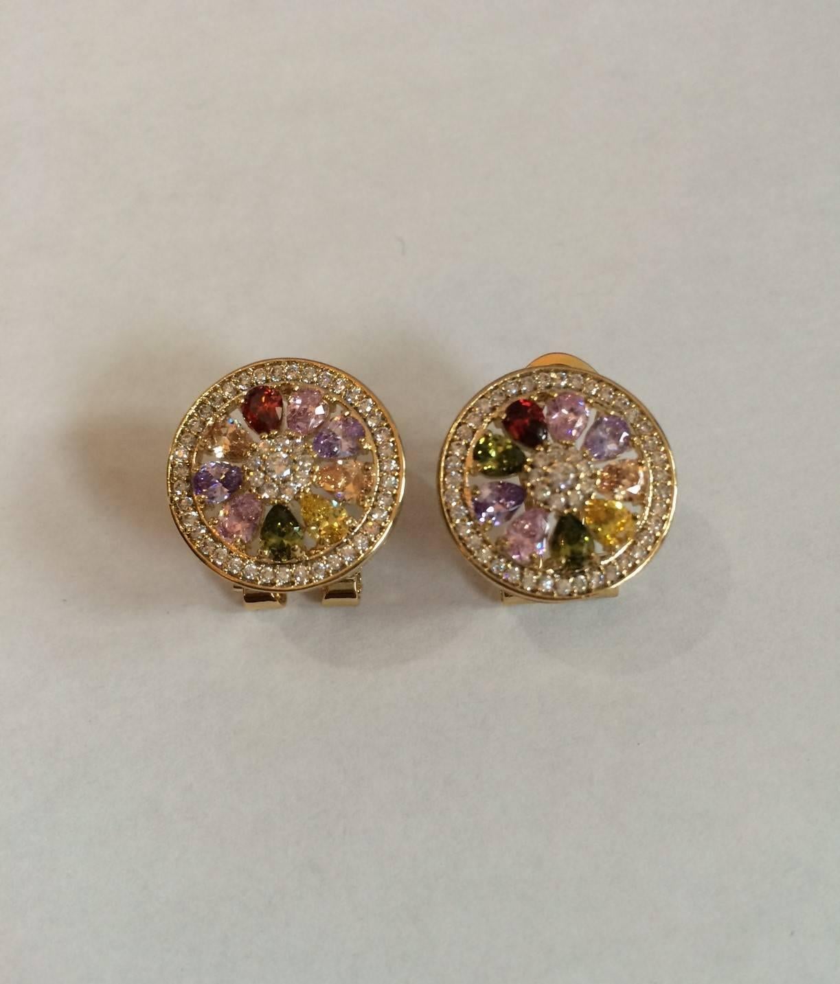 Regency style beautiful Swavorski multi, colored crystals and rhinestones earrings.

Metal: Sterling silver
Stones: Nine centre multicolor Crystallized Swarovski elements and many rhinestones.