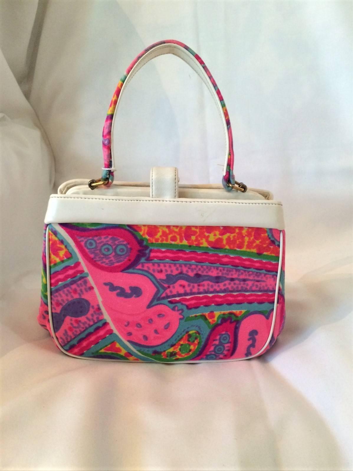 Vintage 1950-1960 David's Fifth Avenue box purse pucci colors. Leather top perimeter with leather a leather strap lock as well as a clasp lock interior. The colors are vibrant and the handbag clean. Some soiling on tag otherwise fine vintage