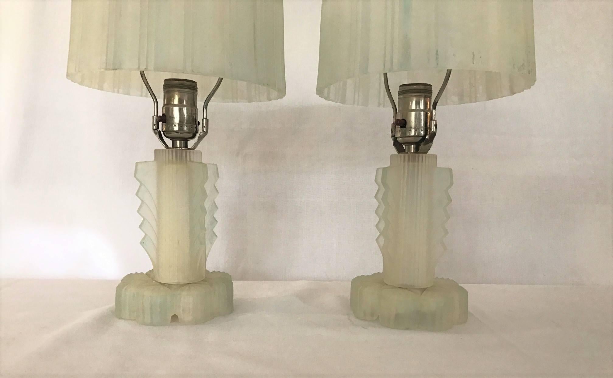 On Sale Now!  Streamlined and Clean Modern Look.  A Pair of Stunning pair of Art Deco Lalique Style Beautiful Frosted All Glass Lamps Gorgeous Nickel Finials with a touch of blue perimeter. Modern Flare.  Streamlined and Clean. 