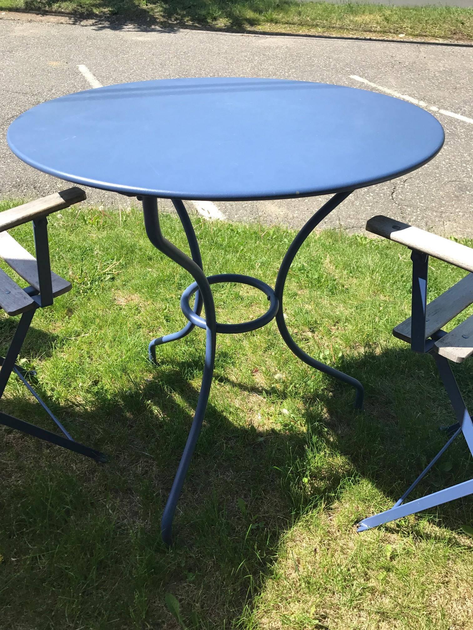 Jardin du Luxembourg in Paris Outdoor French Made Fermob bistro royal blue fabulously made and designed. This is a wonderful set like new. Wooden slat folding chairs with aluminum perimeter's painted a great royal blue. Tabletop of aluminium and