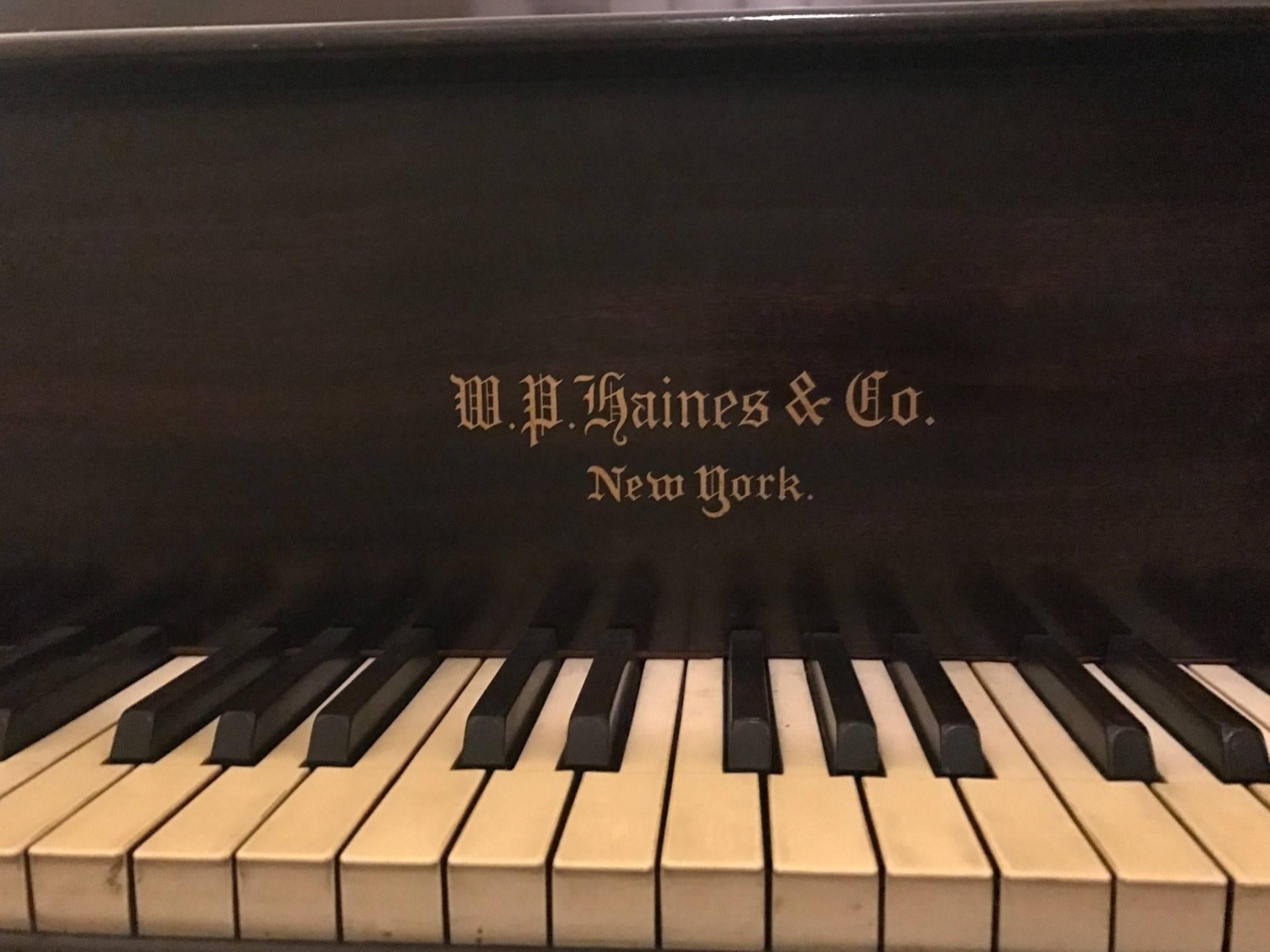 W.P. Haines and Company mahogany grand piano, 1920s. A beautiful piano. On Wheels. Inquire for more information. Inquire for exact measurements.