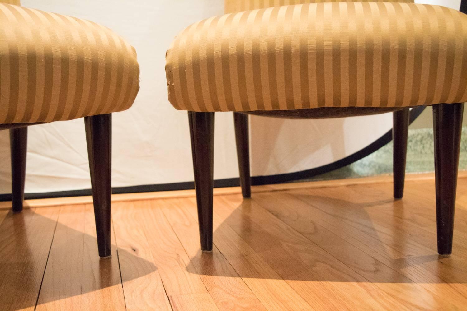 A pair of high quality Viennese Biedermeier style art deco flare slipper chairs covered in silk fabric. Beautiful mahogany legs leading up to a solid perimeter of mahogany. Back in burl wood fabulously upholstered in a high end silk! Magnificently